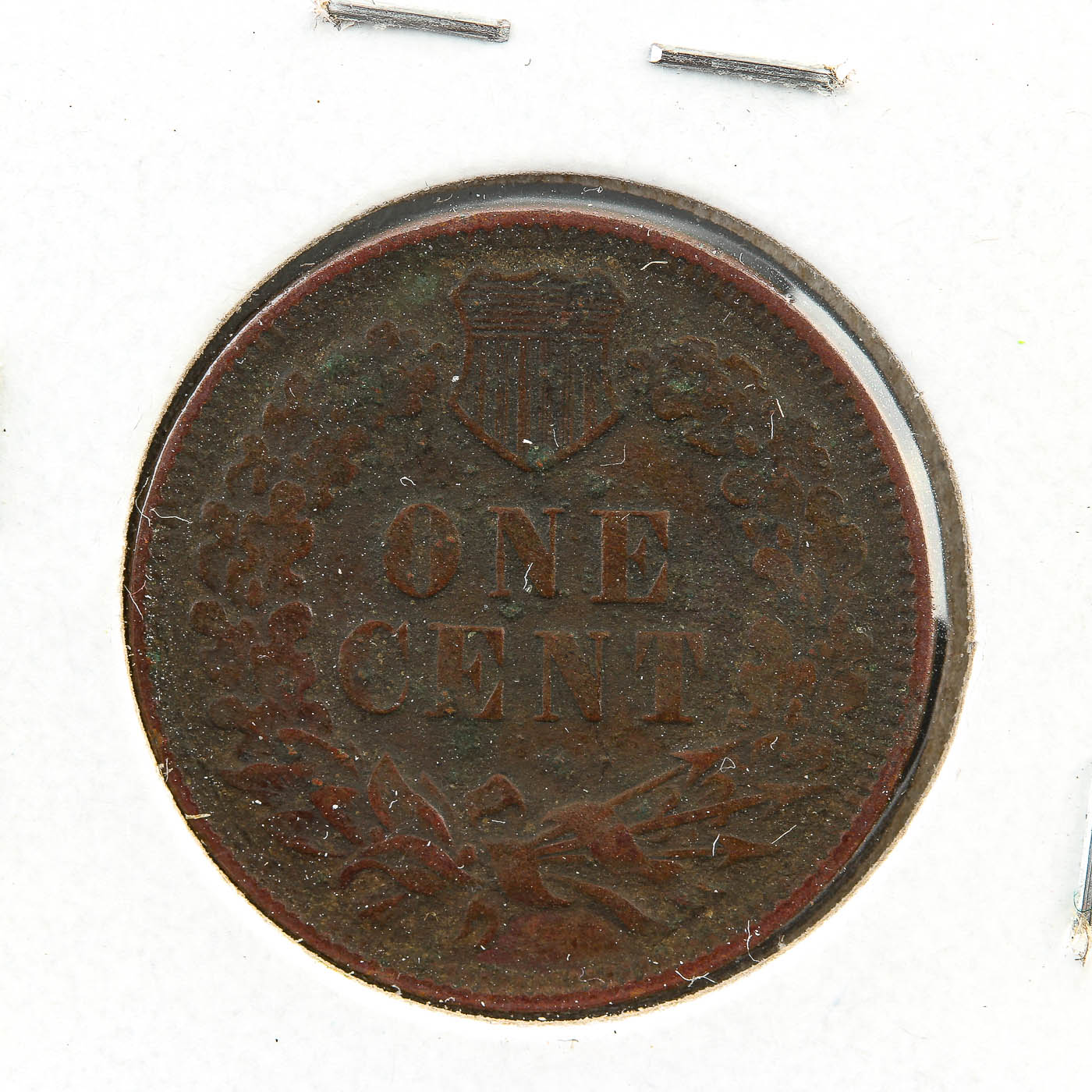 Five Indian Head Cents, Including an 1870 Cent