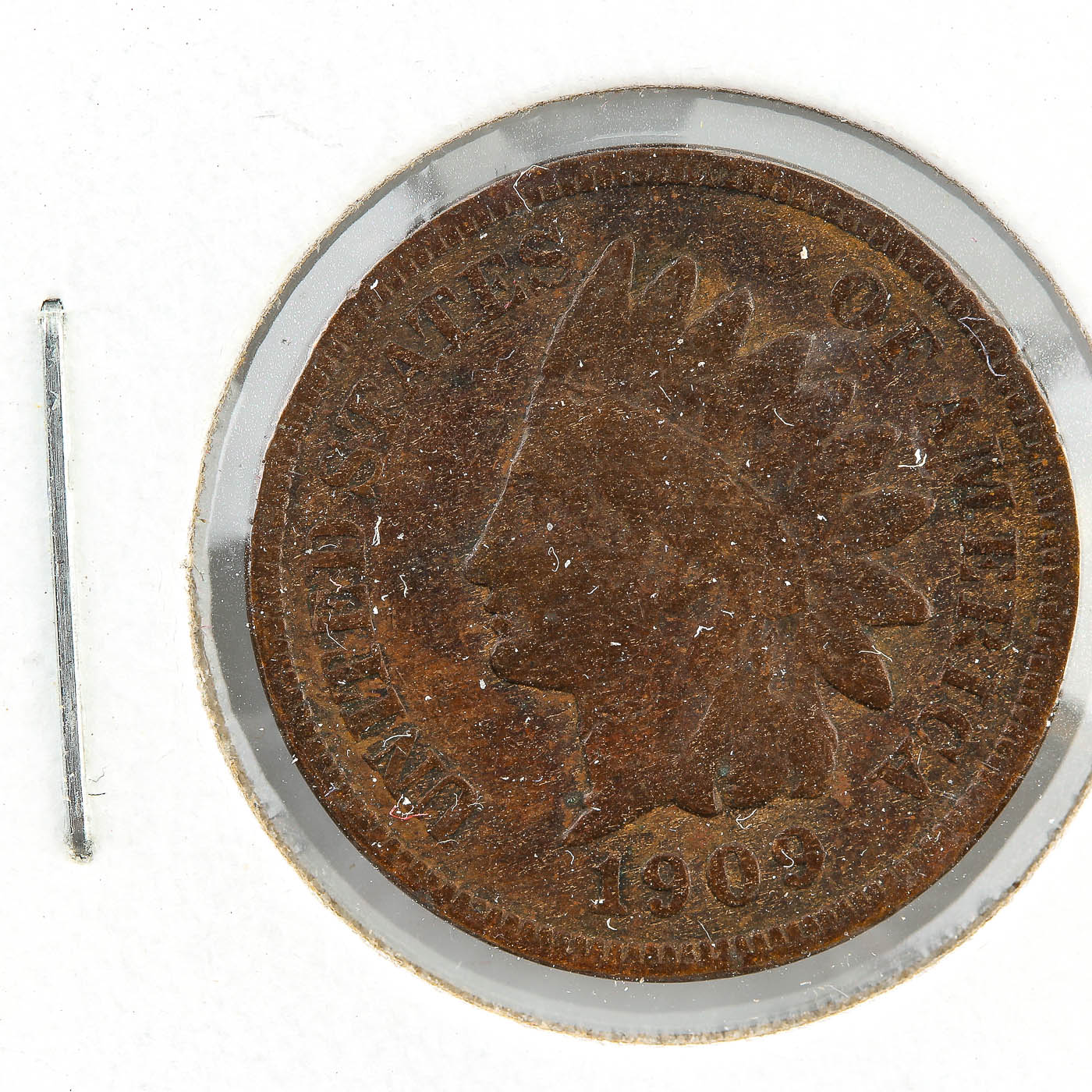 Five Indian Head Cents, Including an 1870 Cent