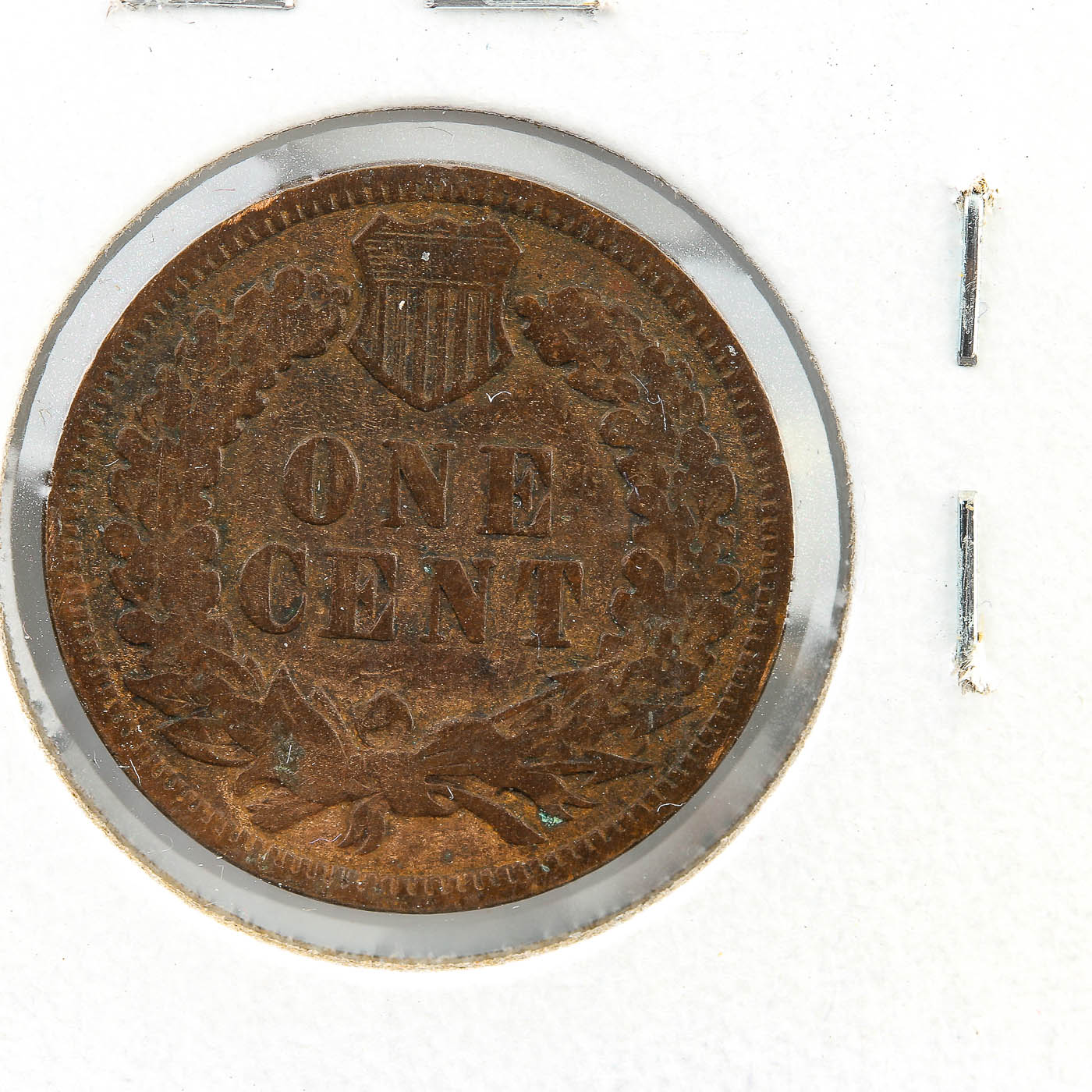 Five Indian Head Cents, Including an 1870 Cent