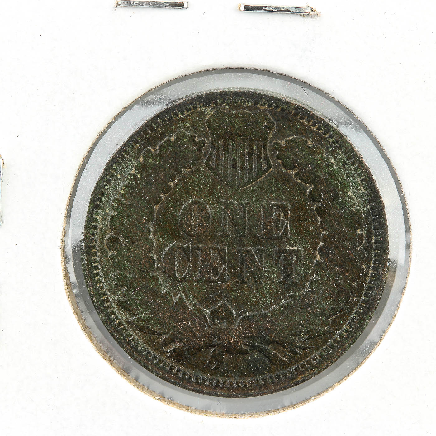 Five Indian Head Cents, Including an 1870 Cent