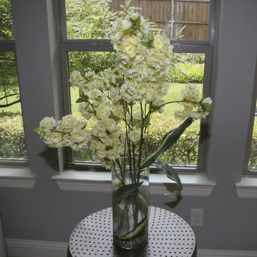 Cylindrical Glass Vase Filled with Bouquet of White Fabric Flowers