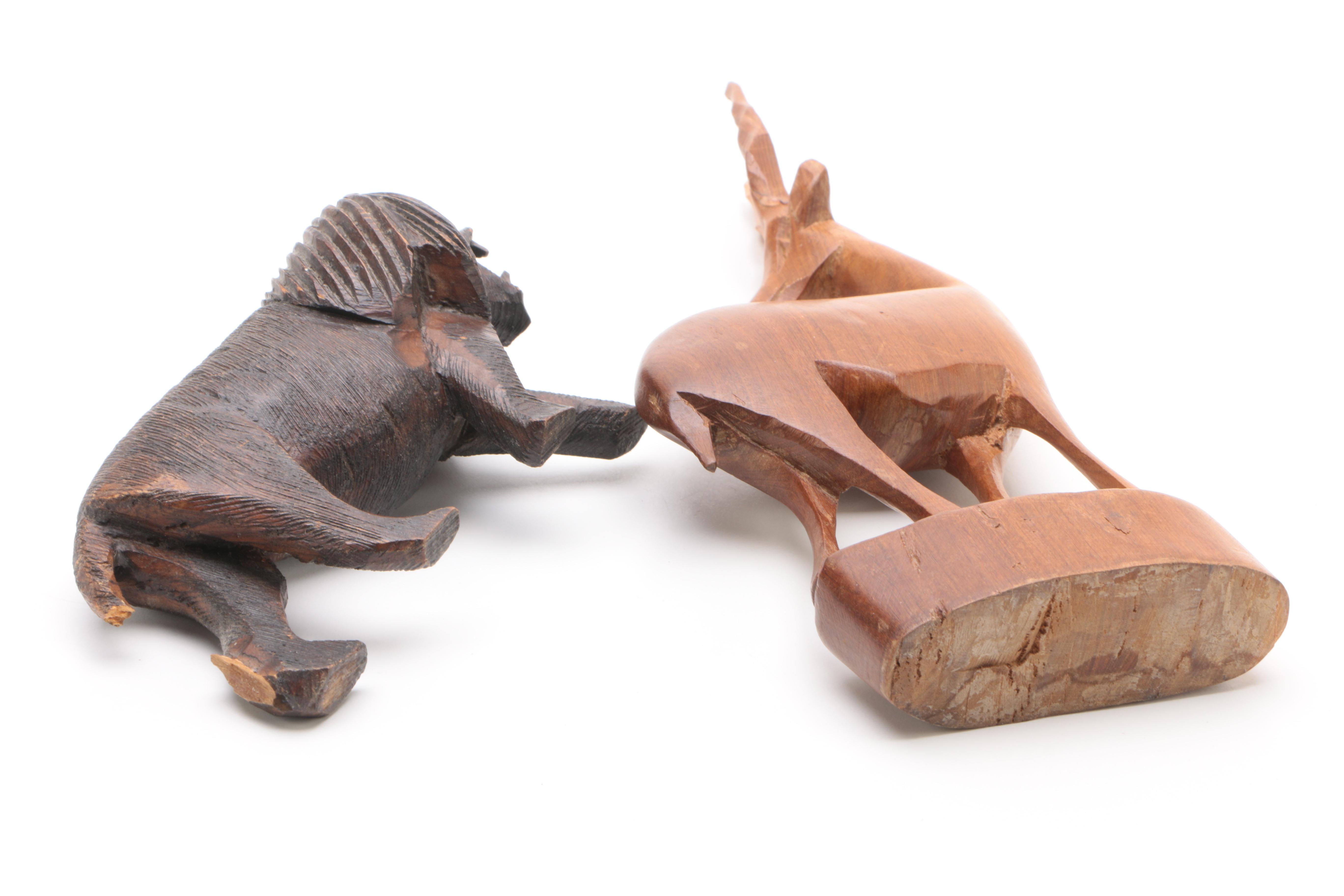 Hand Carved Animal Figurines Featuring Industrial Workshop