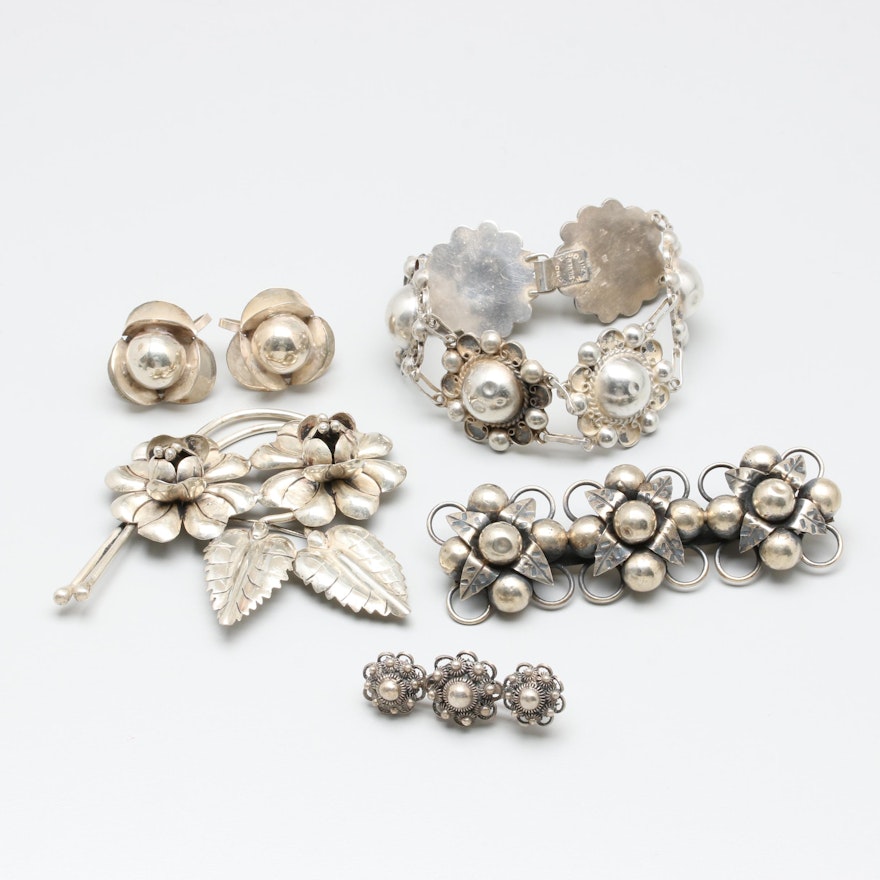 Sterling Silver Jewelry Assortment Featuring Floral Motifs