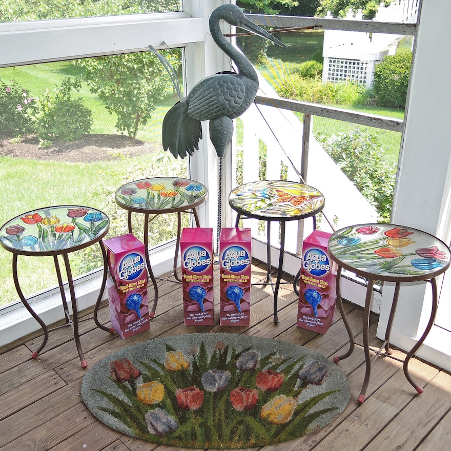 Colored Glass Patio Tables, Crane Lawn Ornament, Rug and Blown Glass Globes