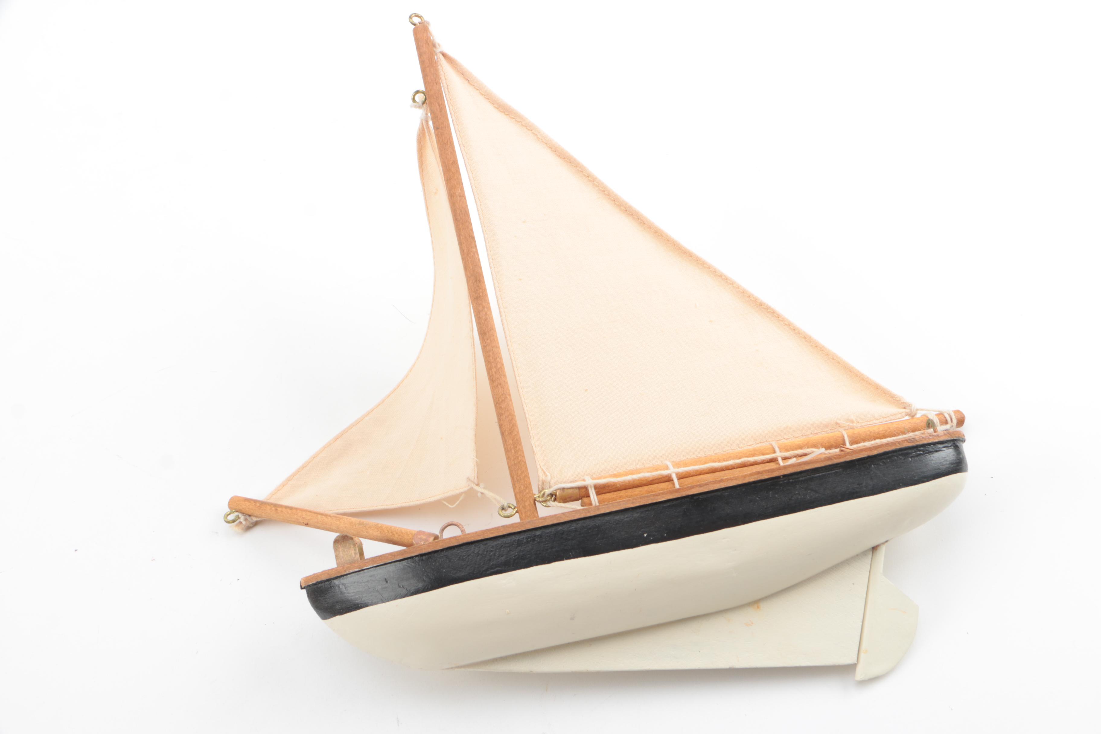Vintage Wooden Sailboat and East Asian Inspired Decor