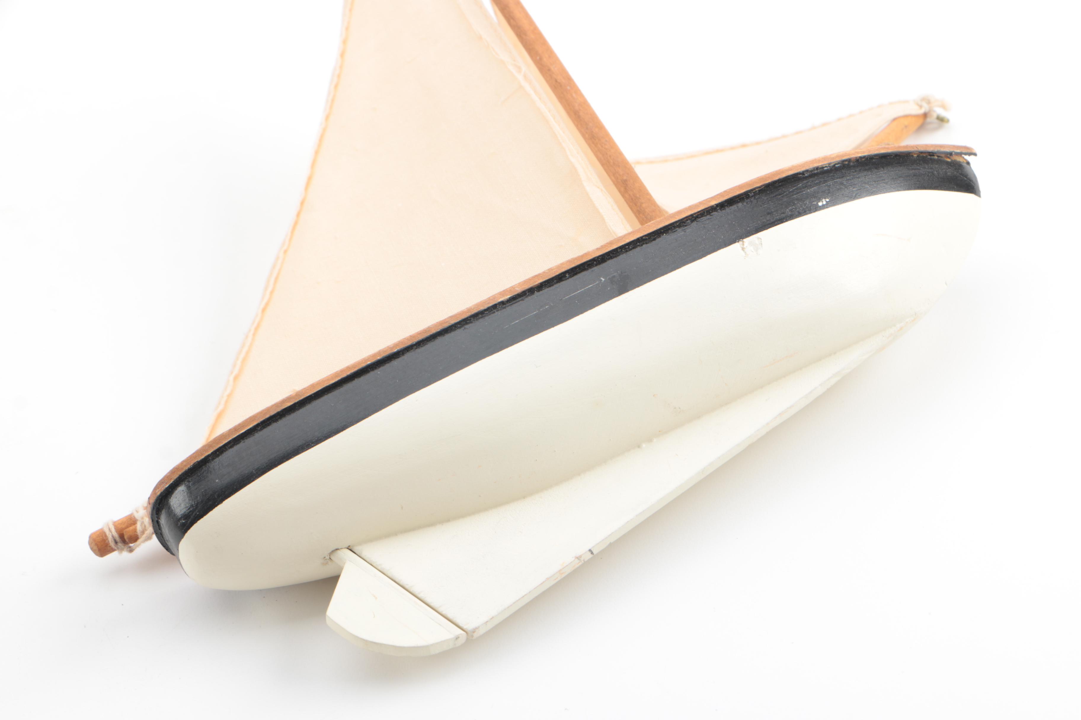 Vintage Wooden Sailboat and East Asian Inspired Decor