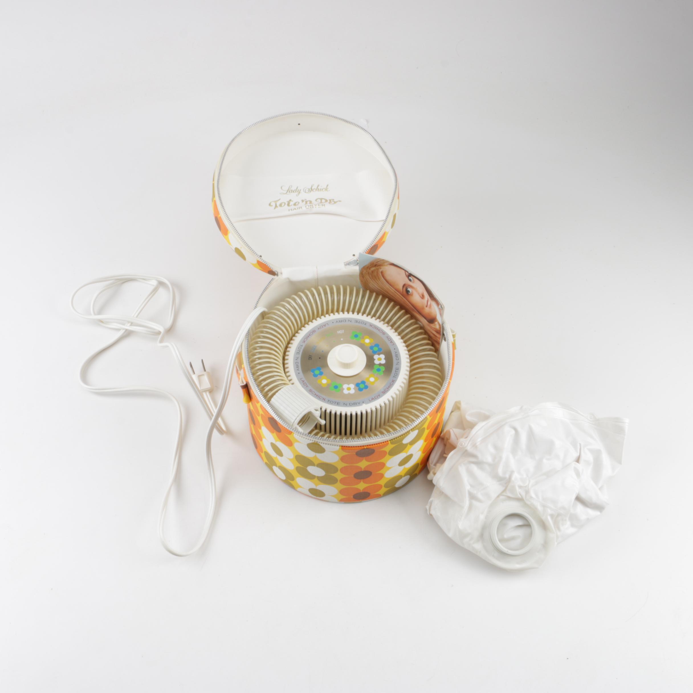 1960s Lady Schick Tote 'N Dry Hair Dryer with Mid-Century Floral Case