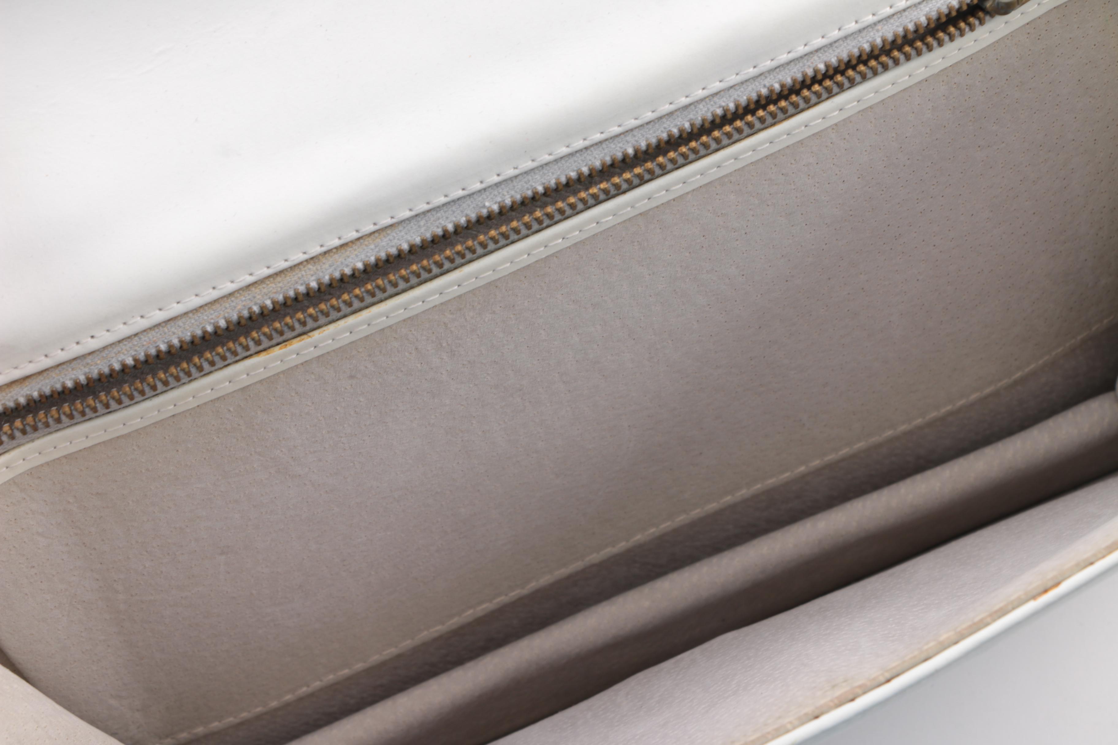 1980s Leather, Suede and Woven Clutches Including Safari