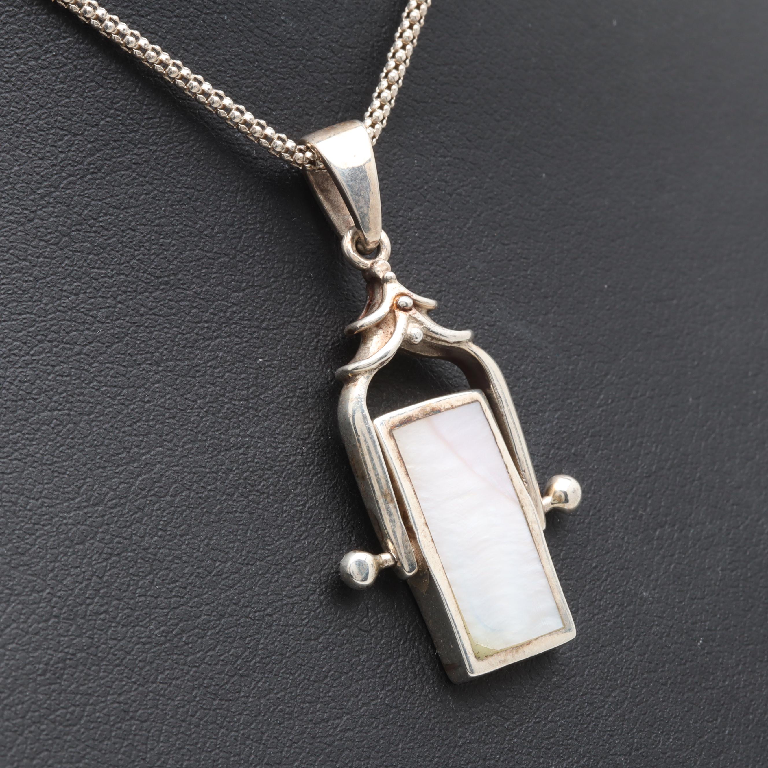 Sterling Silver Black Onyx and Mother of Pearl Reversible Pendant Necklace