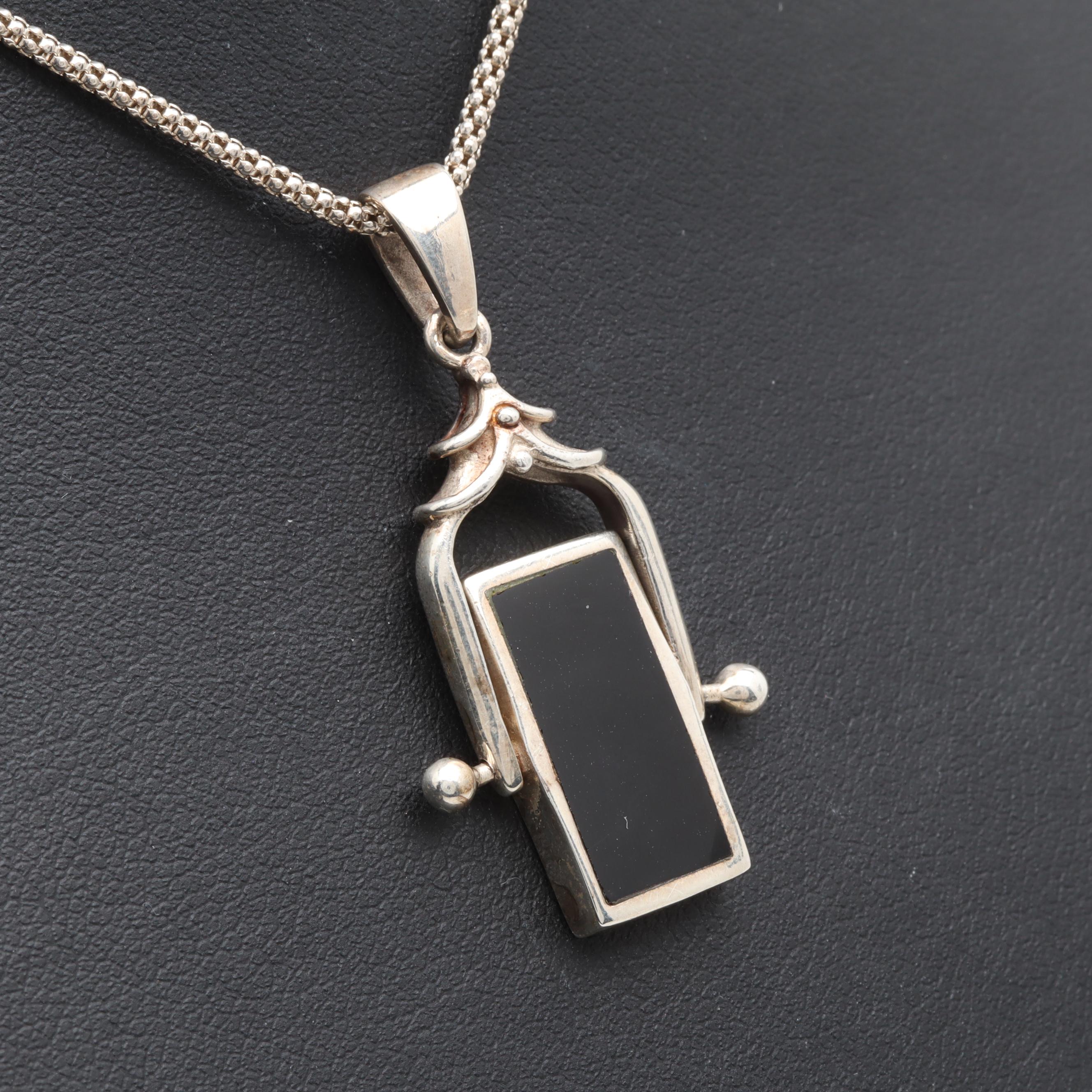 Sterling Silver Black Onyx and Mother of Pearl Reversible Pendant Necklace