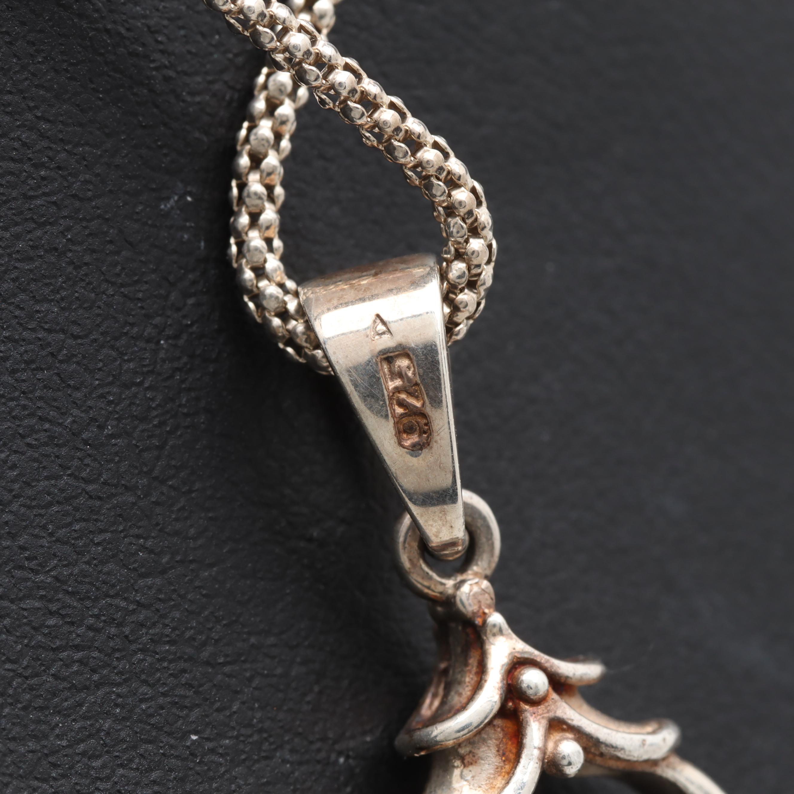 Sterling Silver Black Onyx and Mother of Pearl Reversible Pendant Necklace