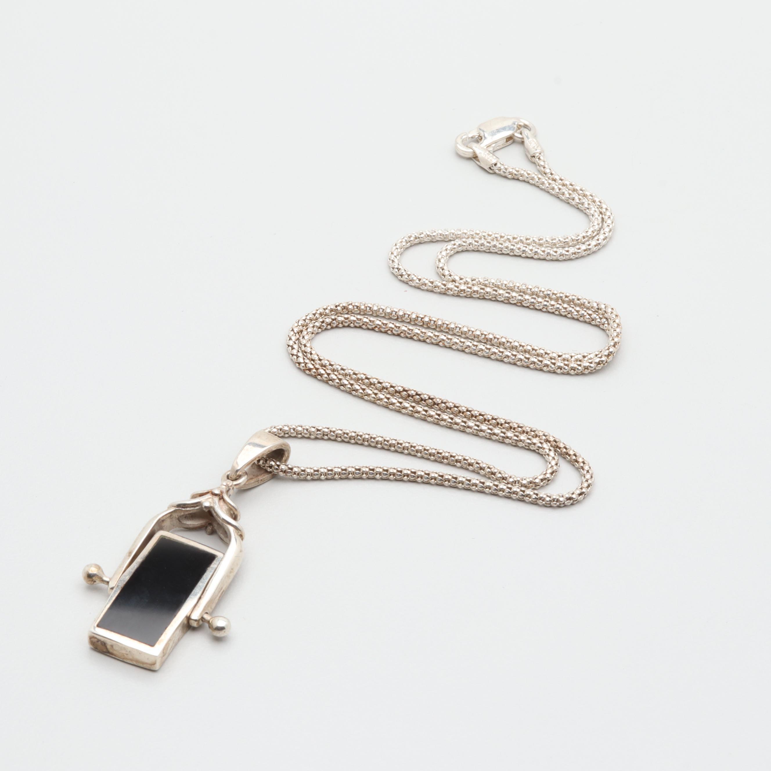 Sterling Silver Black Onyx and Mother of Pearl Reversible Pendant Necklace