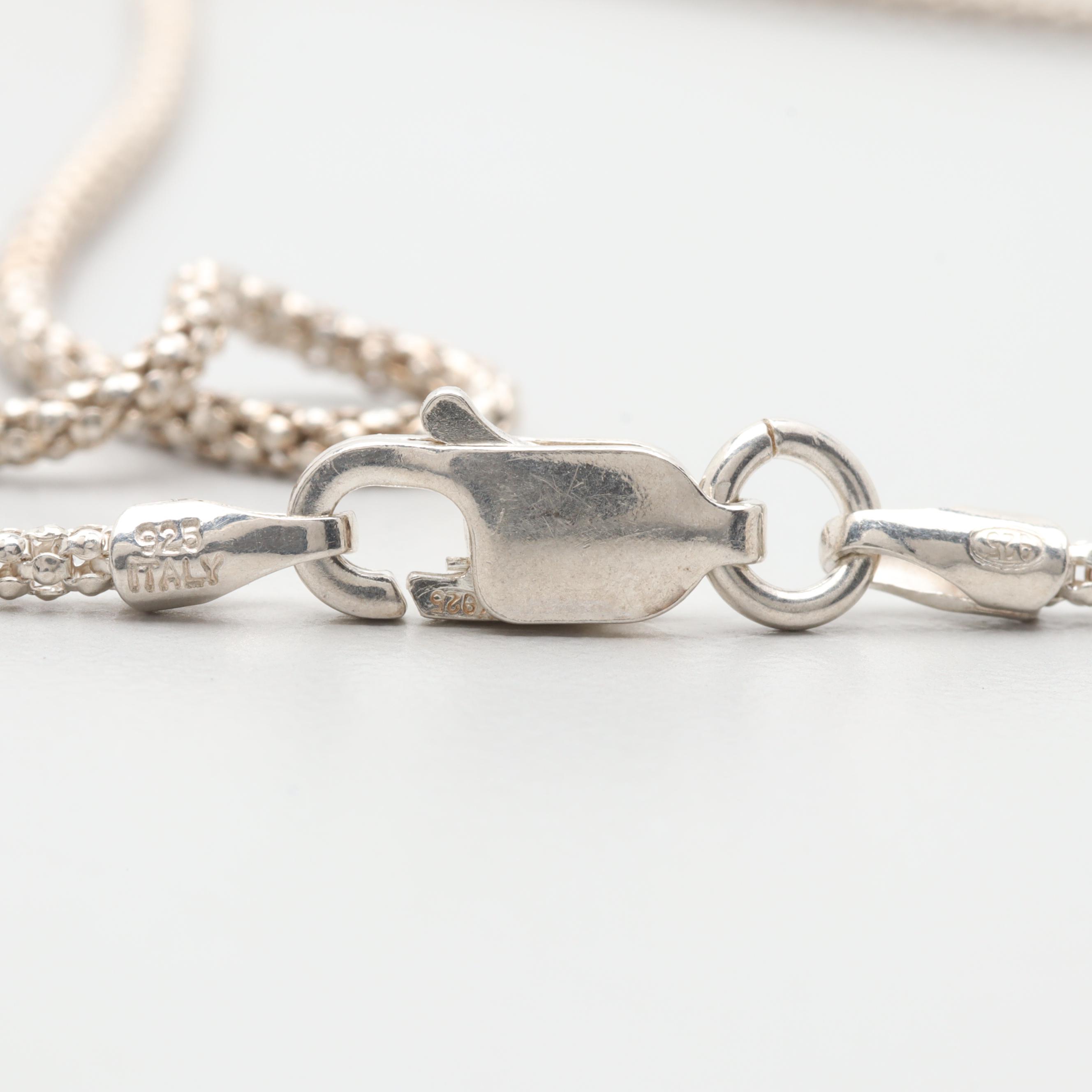 Sterling Silver Black Onyx and Mother of Pearl Reversible Pendant Necklace