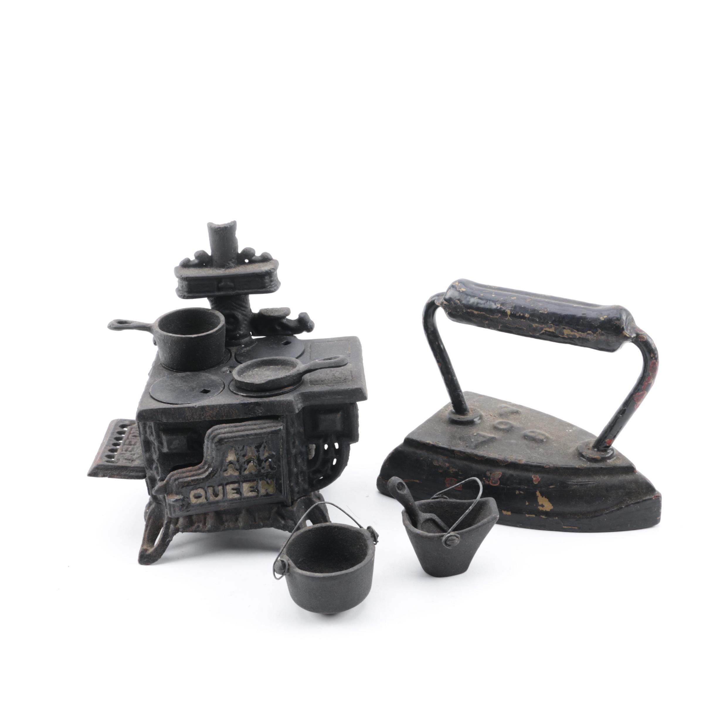 Reproduction Queen Cast Iron Miniature Stove and Vintage ACW Sad Iron