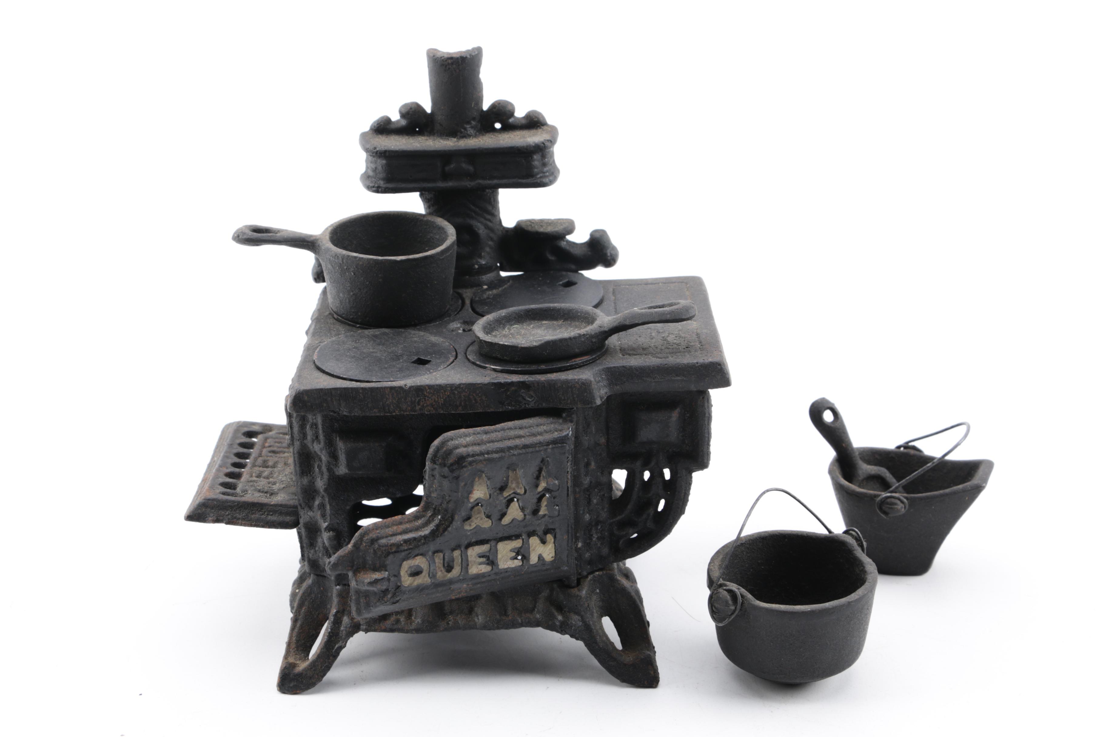 Reproduction Queen Cast Iron Miniature Stove and Vintage ACW Sad Iron