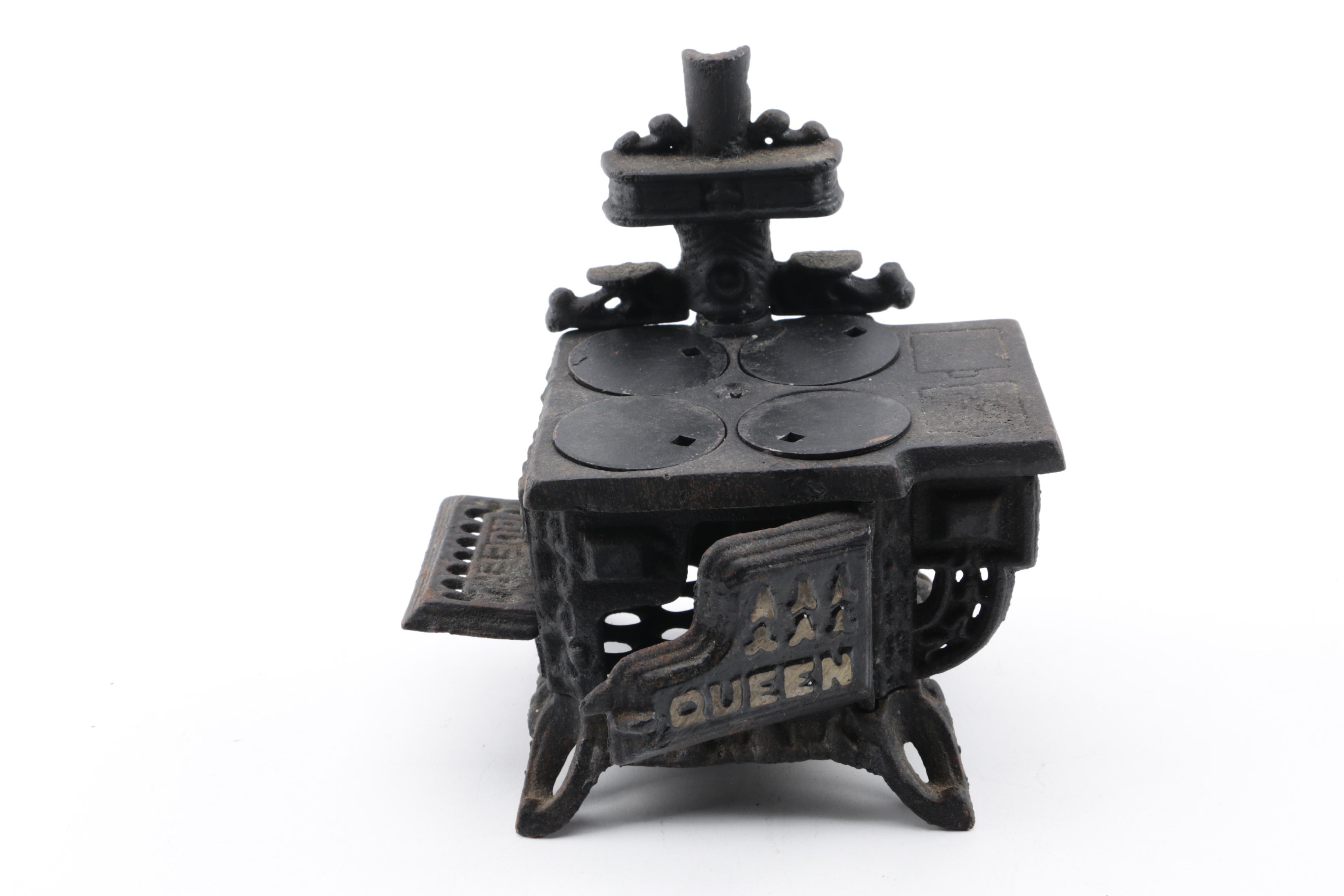 Reproduction Queen Cast Iron Miniature Stove and Vintage ACW Sad Iron