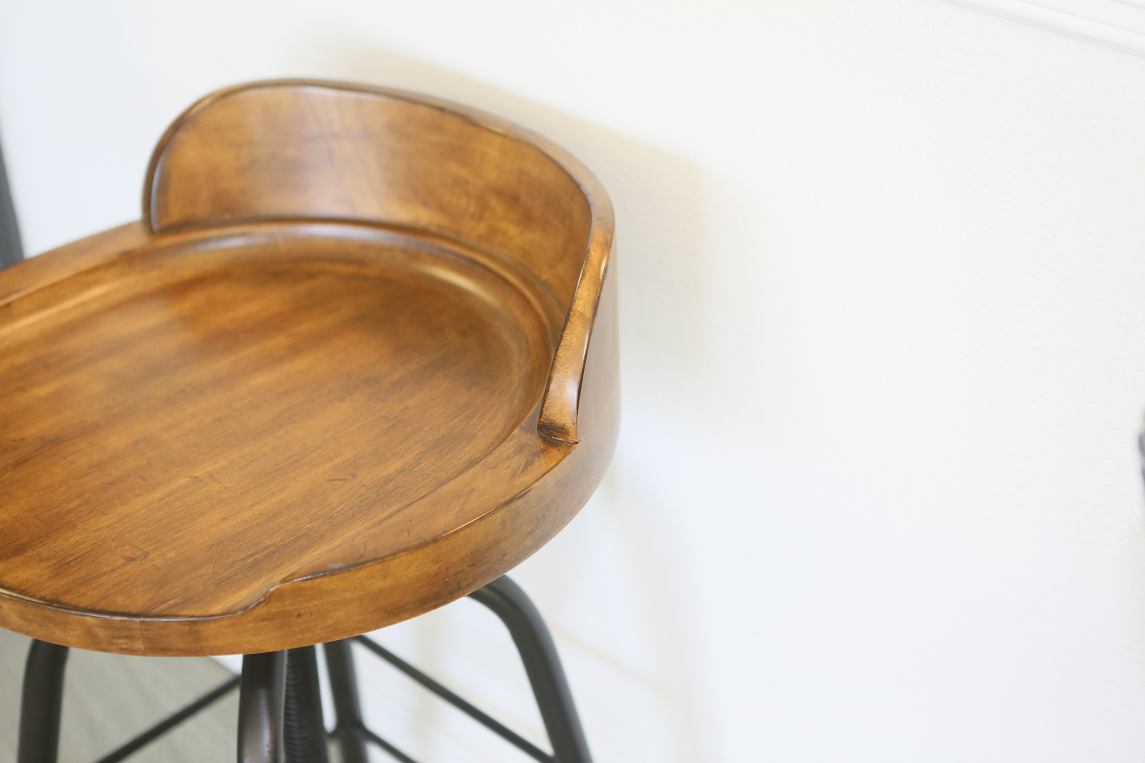 Three Low Back Wooden Swivel Stools