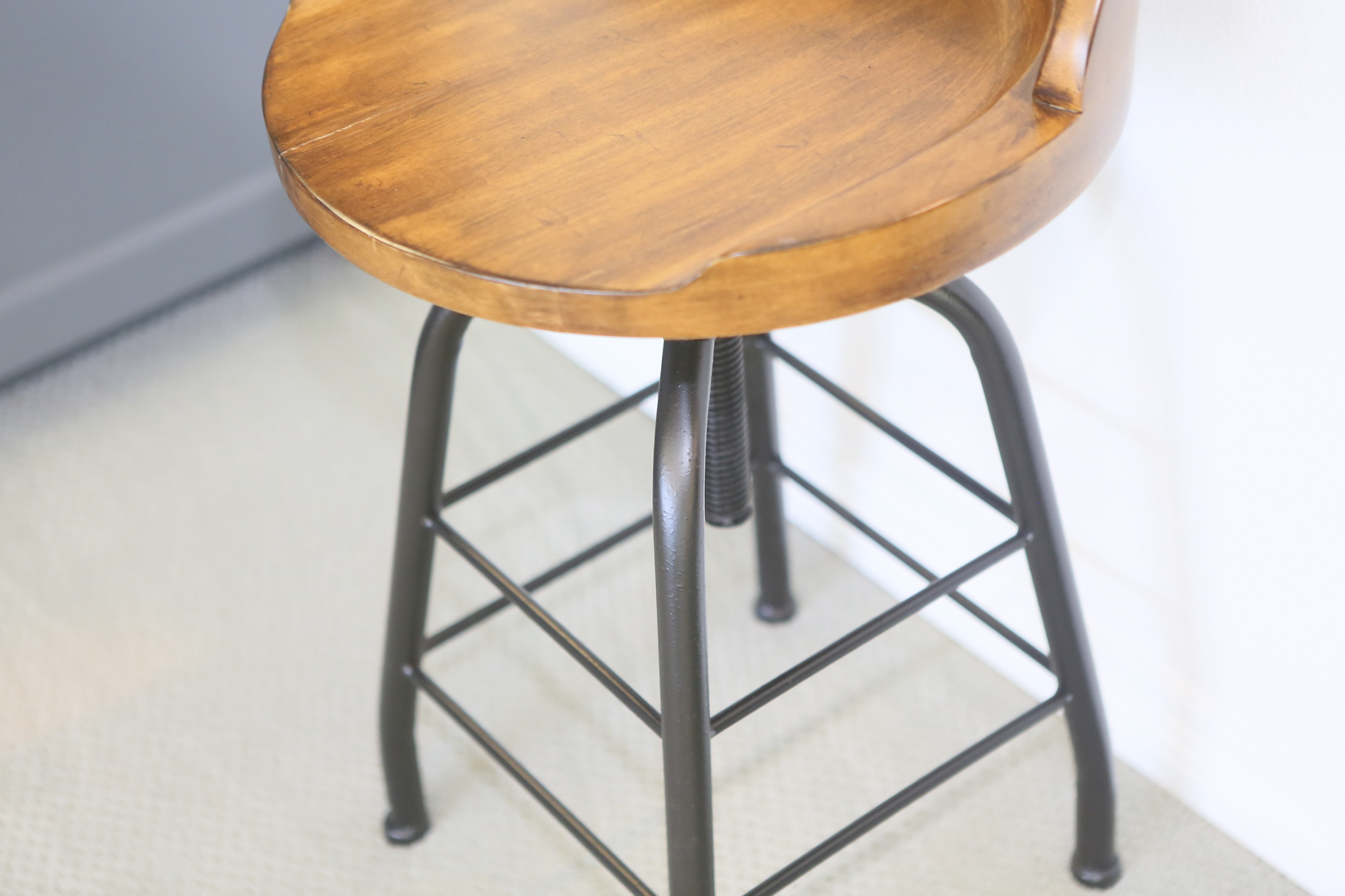 Three Low Back Wooden Swivel Stools