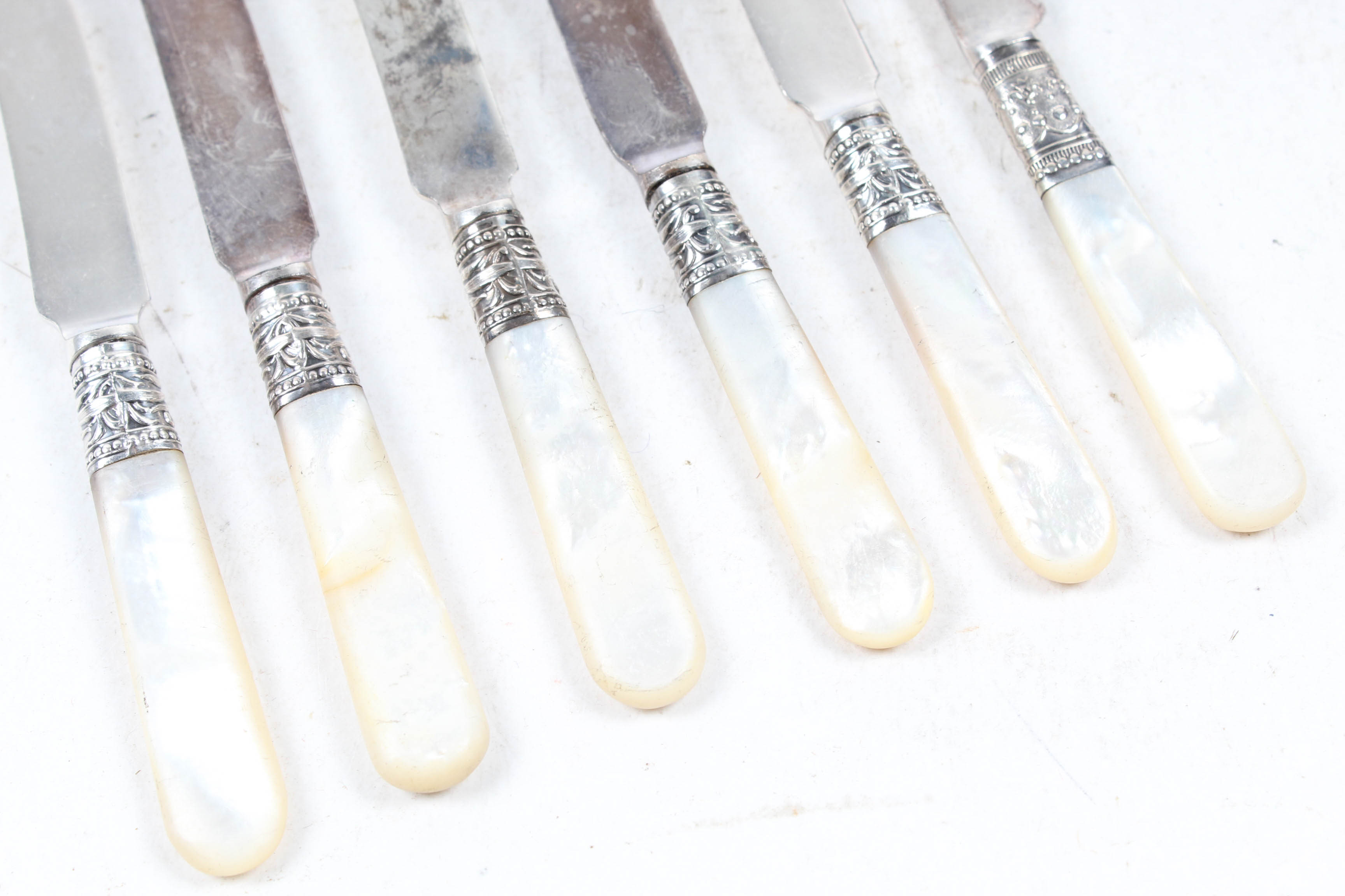 Vintage Sterling Silver Accented Mother of Pearl Knives