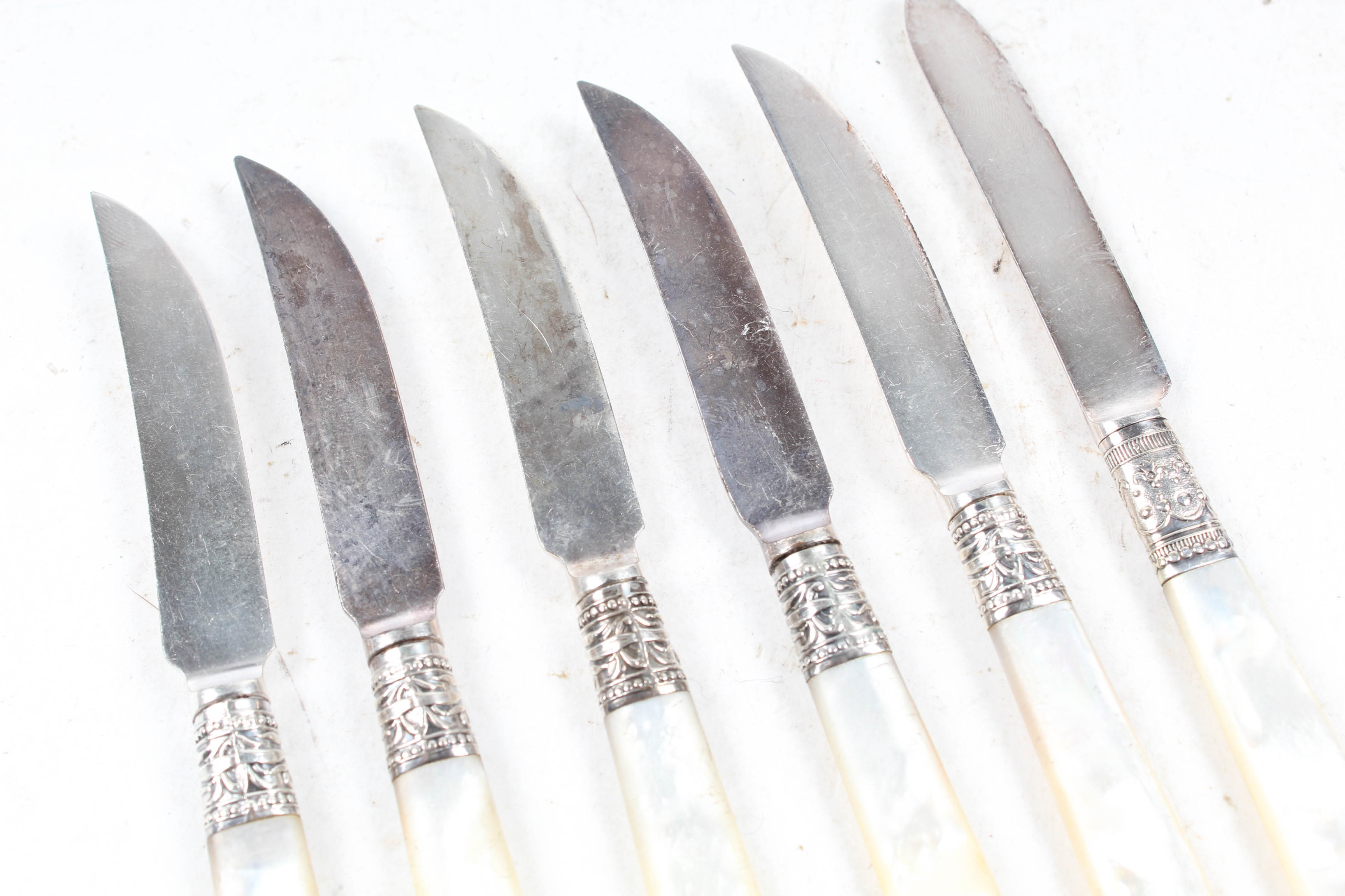 Vintage Sterling Silver Accented Mother of Pearl Knives