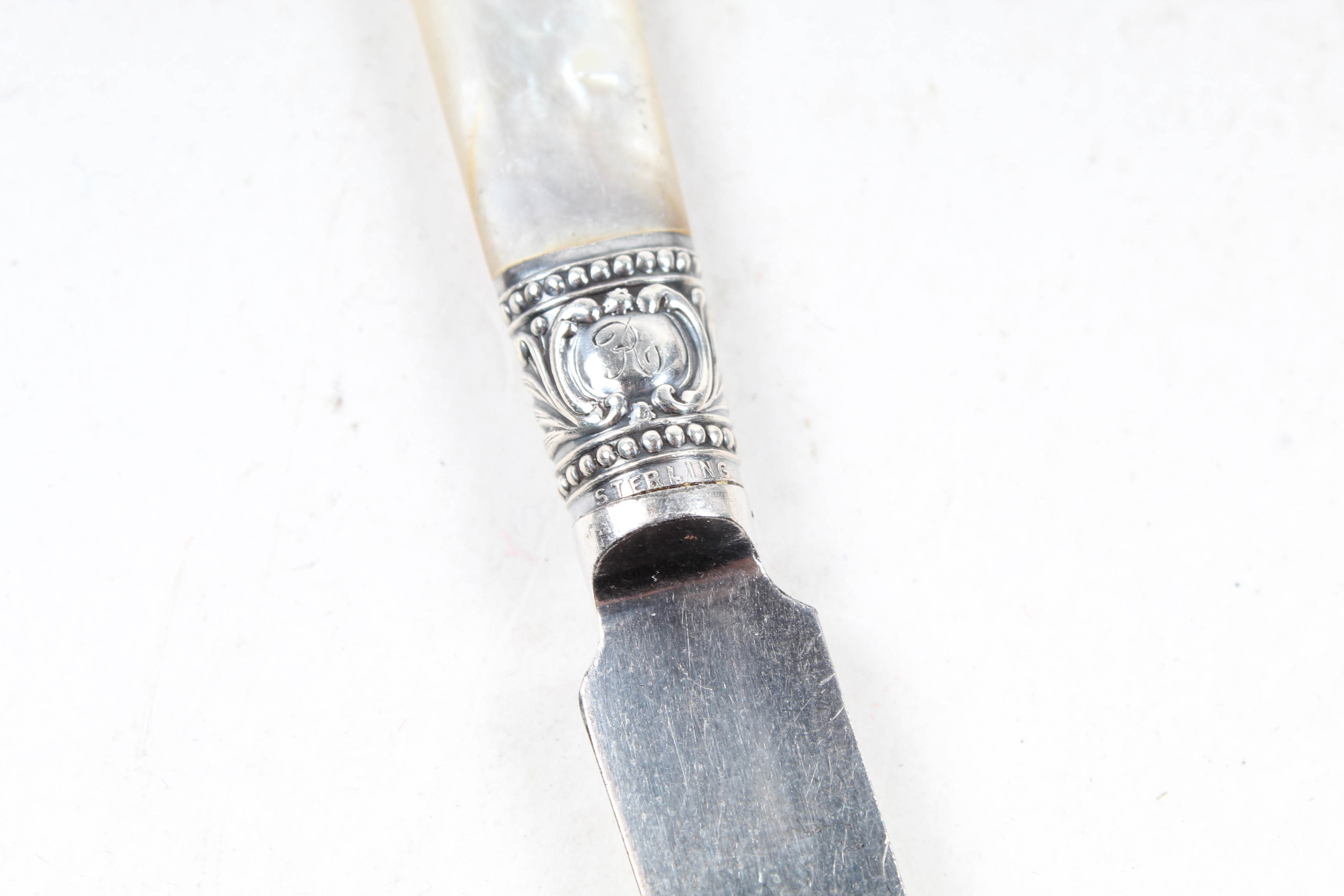 Vintage Sterling Silver Accented Mother of Pearl Knives