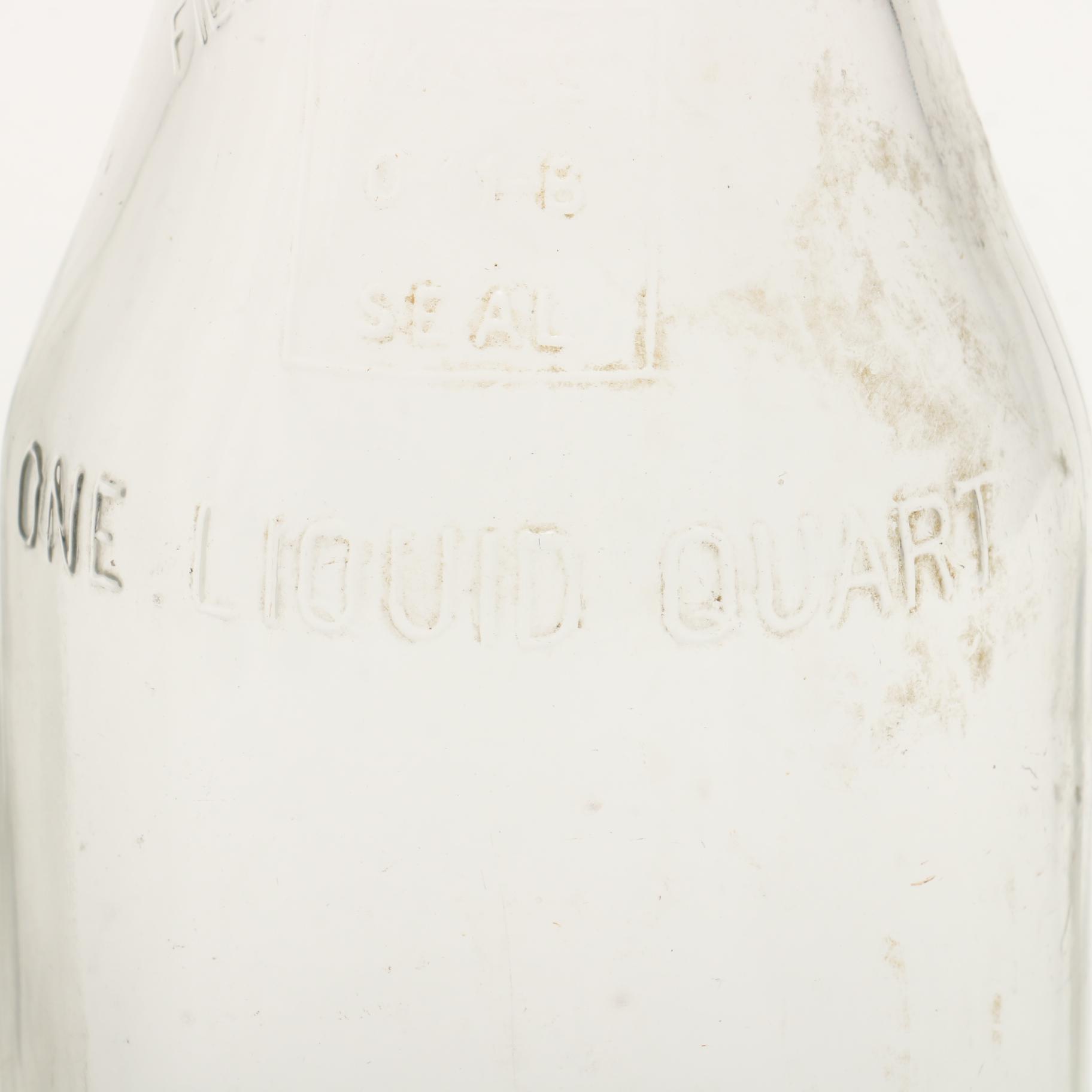 Vintage Quart Oil Bottles with Spouts Featuring Mobil Oil AF