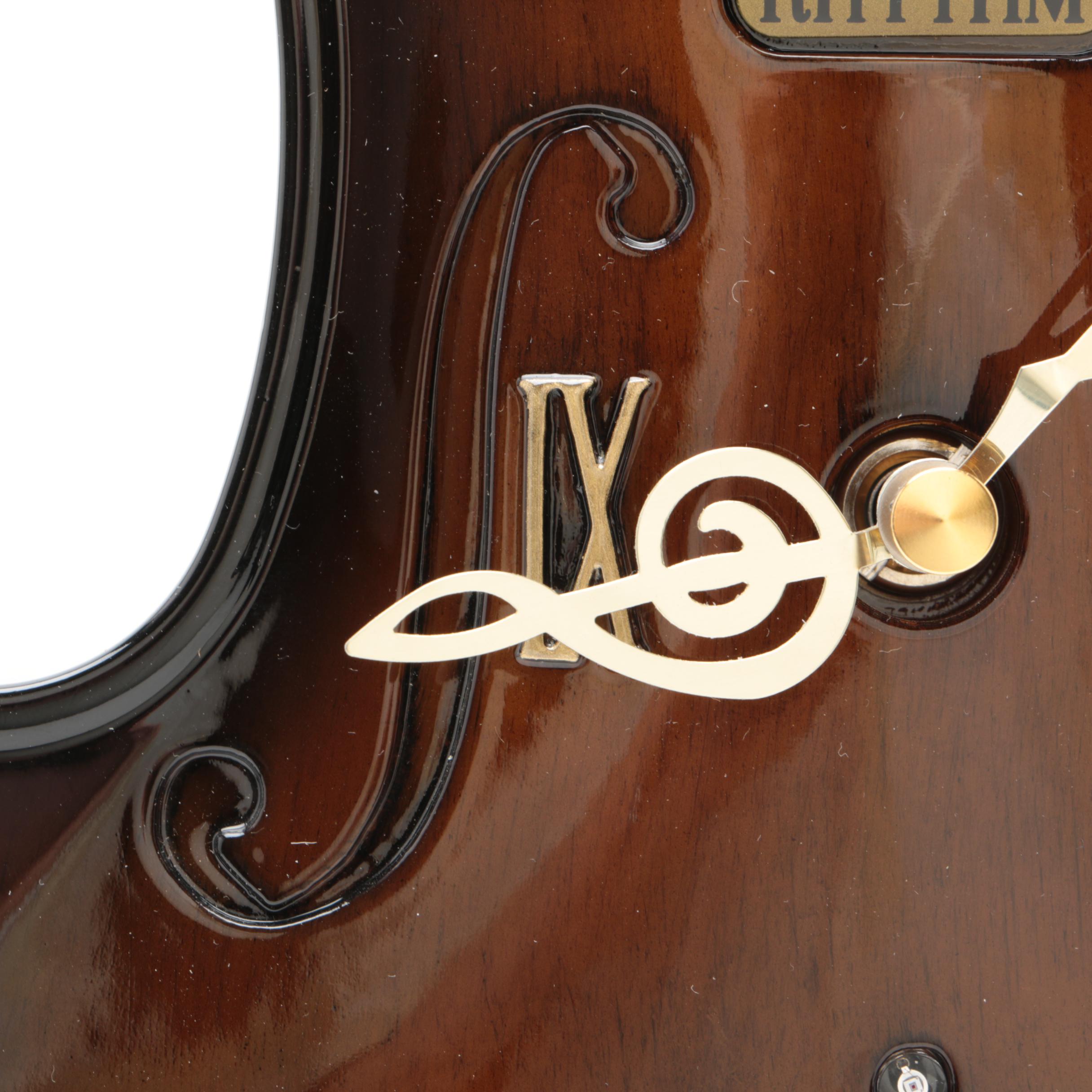 Rhythm "Fiddler" Musical Wall Clock