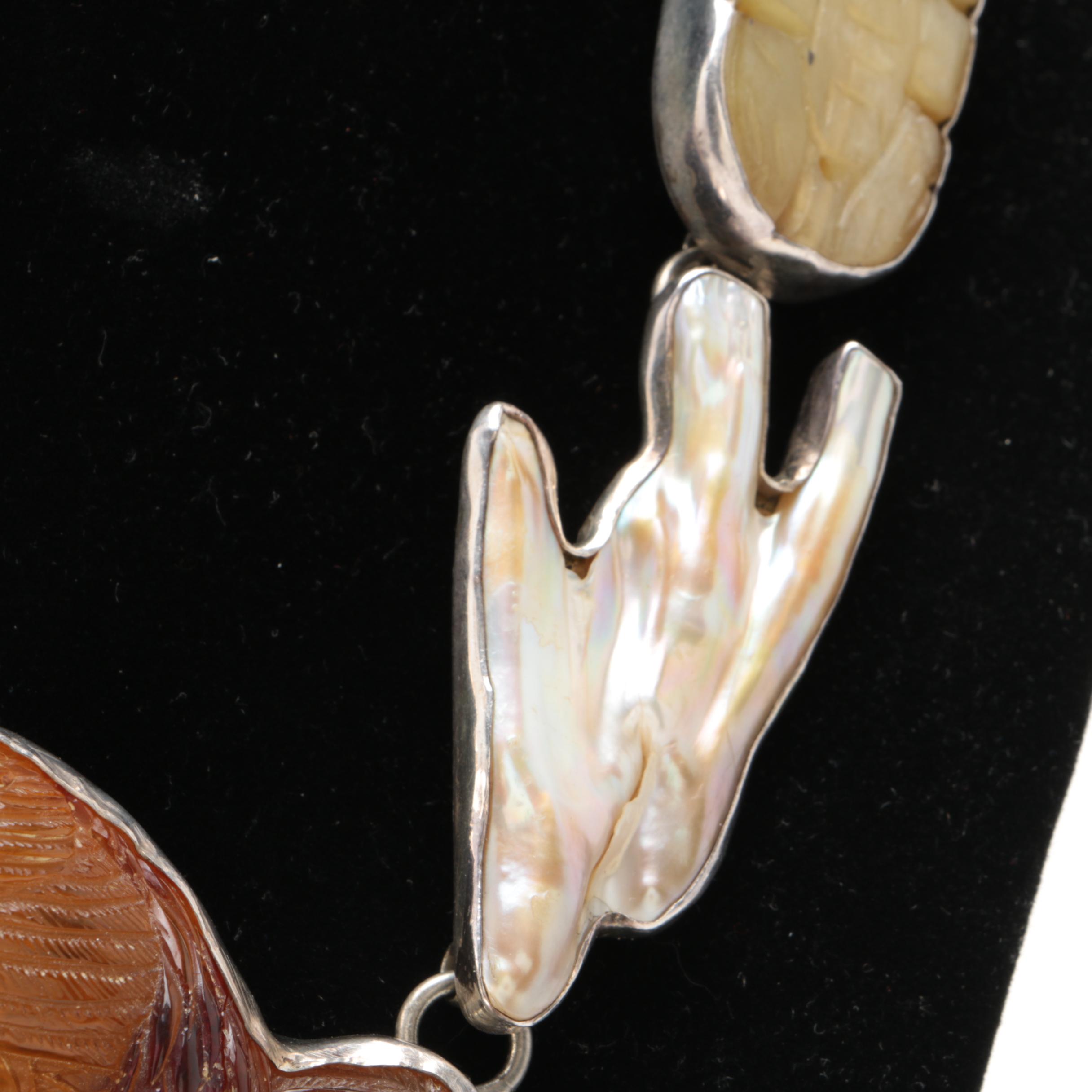 Rebecca Collins "Bless Our Earth" Sterling Silver Carved Copal Necklace