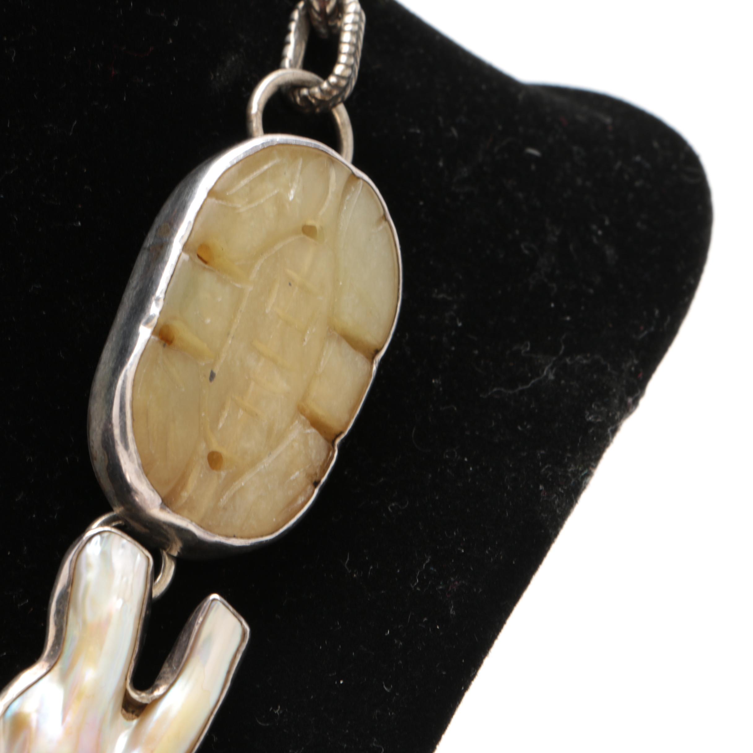 Rebecca Collins "Bless Our Earth" Sterling Silver Carved Copal Necklace