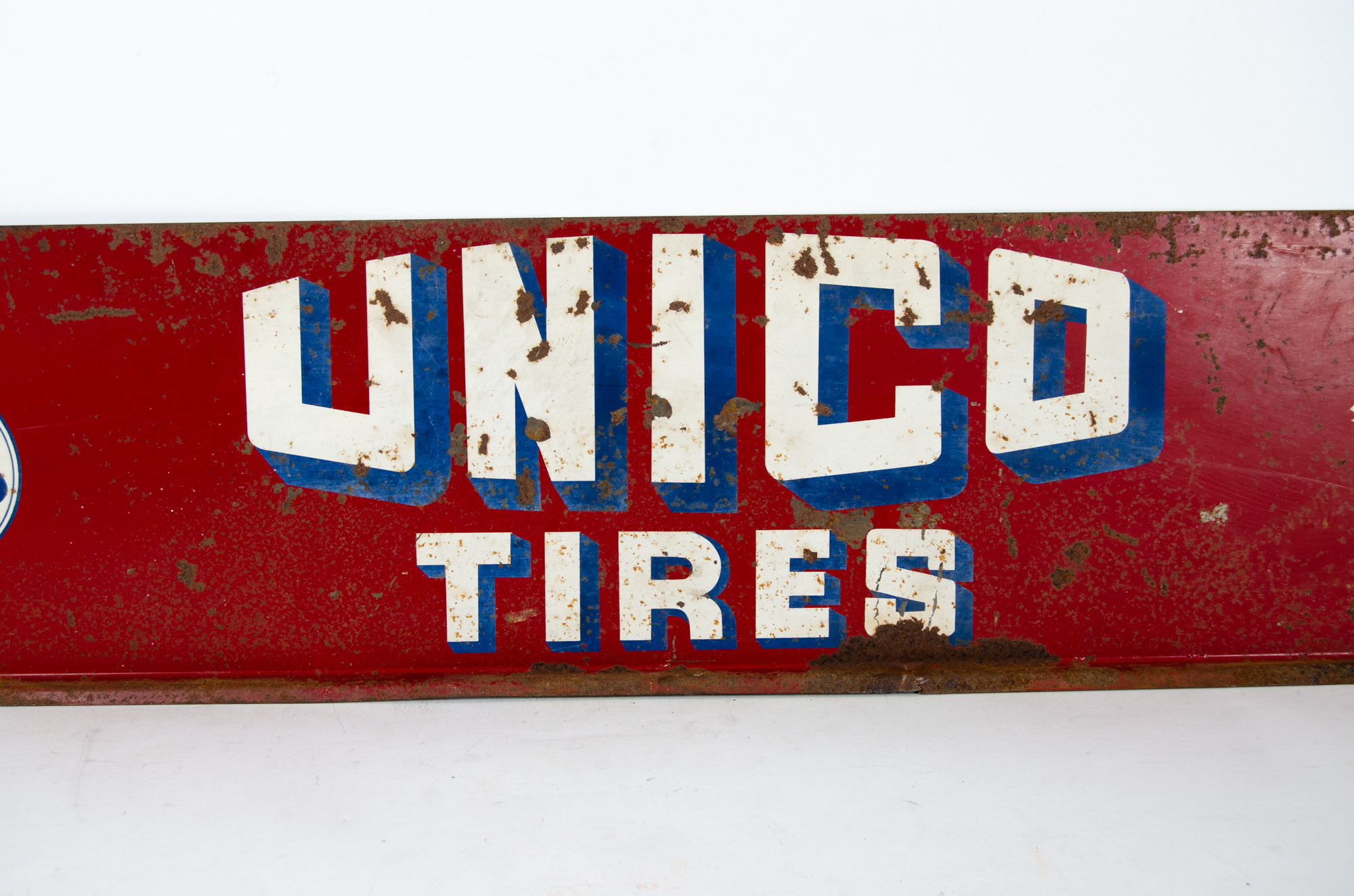 Vintage Unico Tires Advertisement Sign