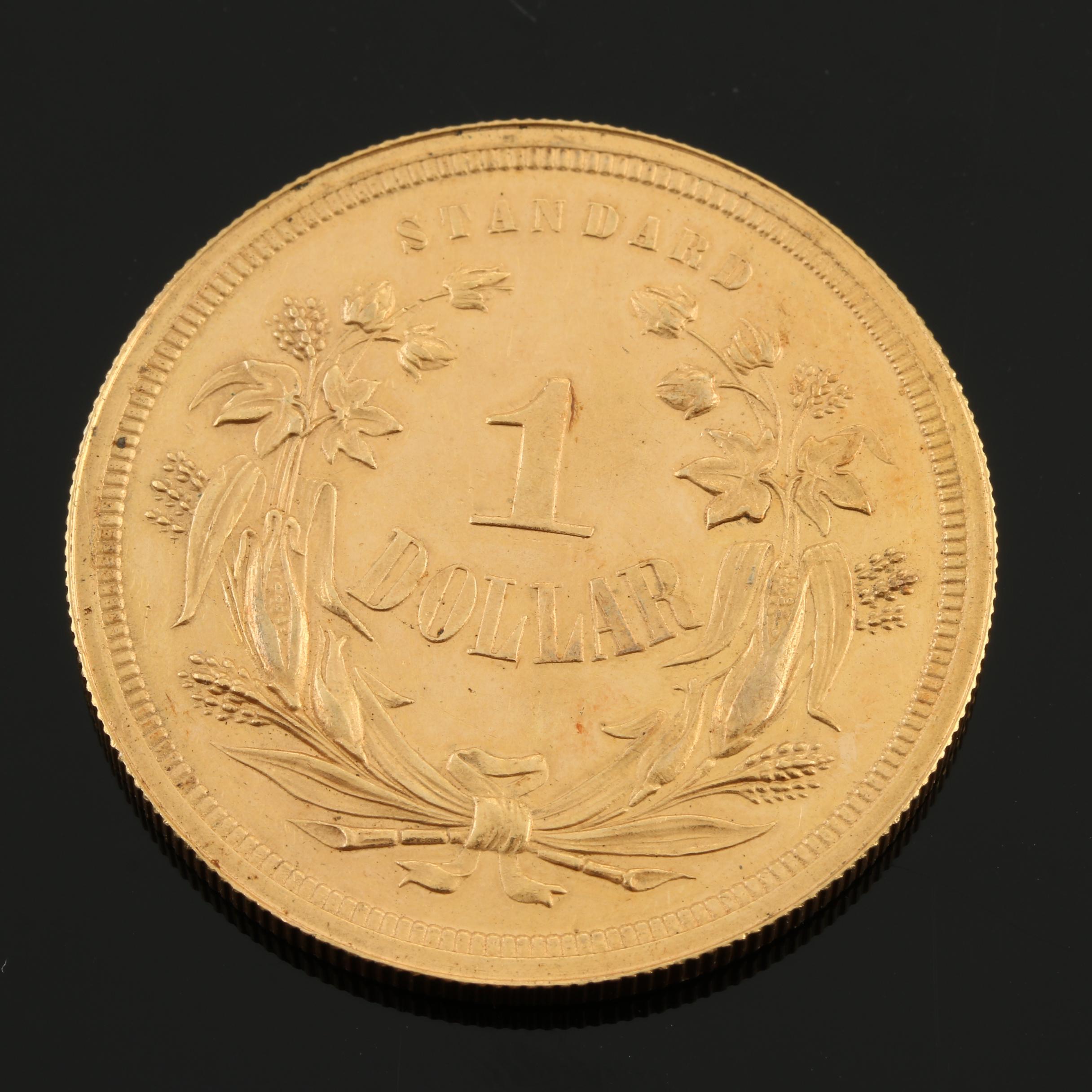 Gold Replica of an 1871 Liberty Seated Dollar Pattern Proof Coin