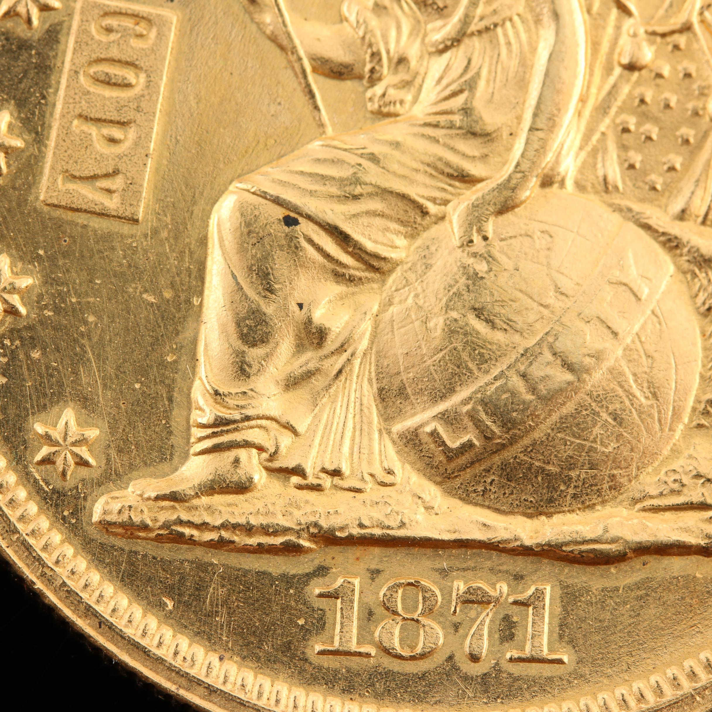 Gold Replica of an 1871 Liberty Seated Dollar Pattern Proof Coin