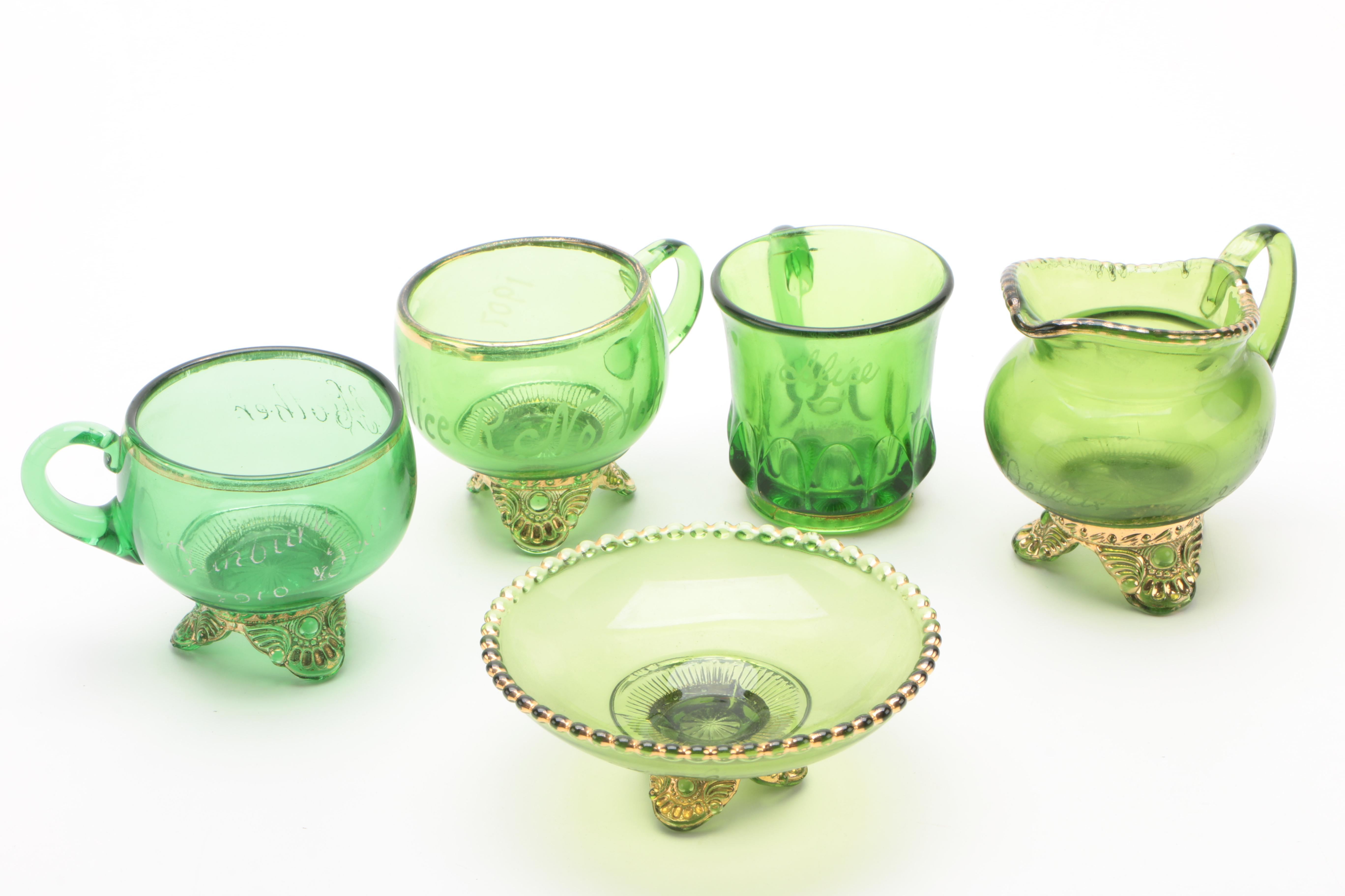 Group of Seventeen New York State Souvenir Green Glass Table Articles