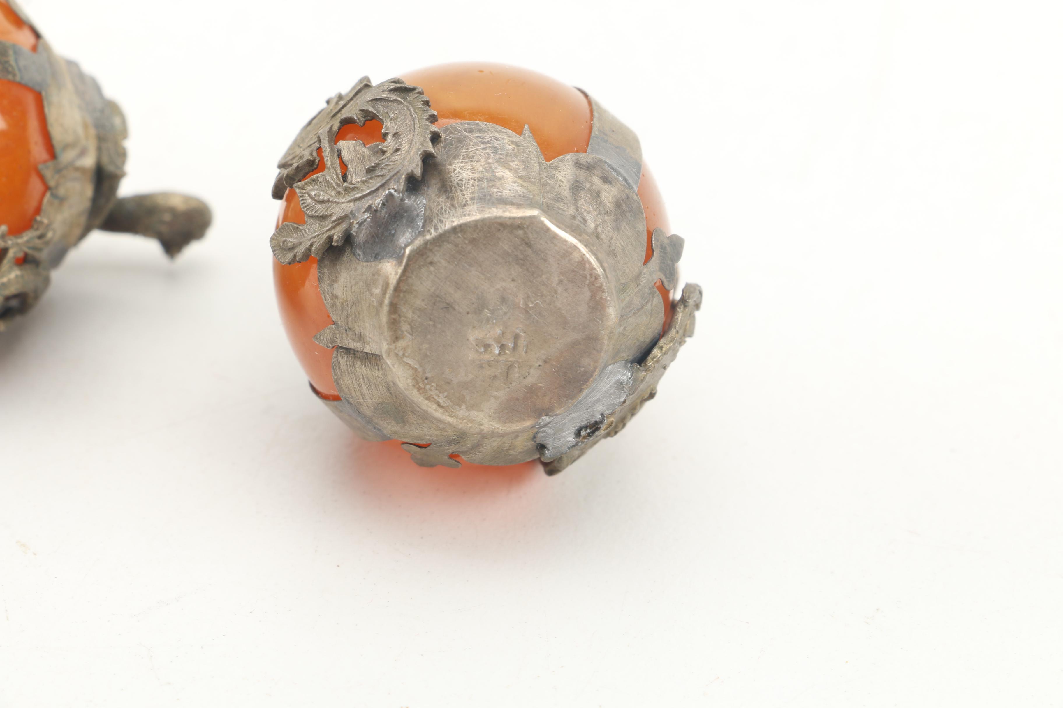 Chinese Brass and Orange Glass Figural Orbs