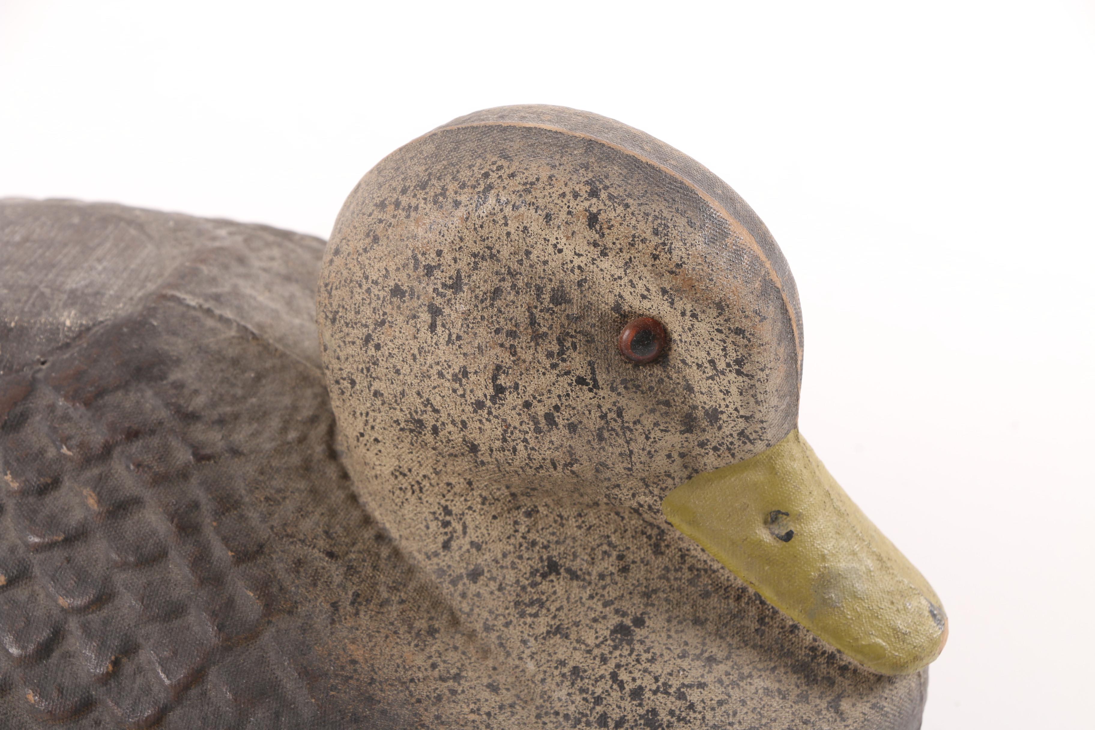 Compressed Paper Duck Decoy and a Cork Duck Decoy