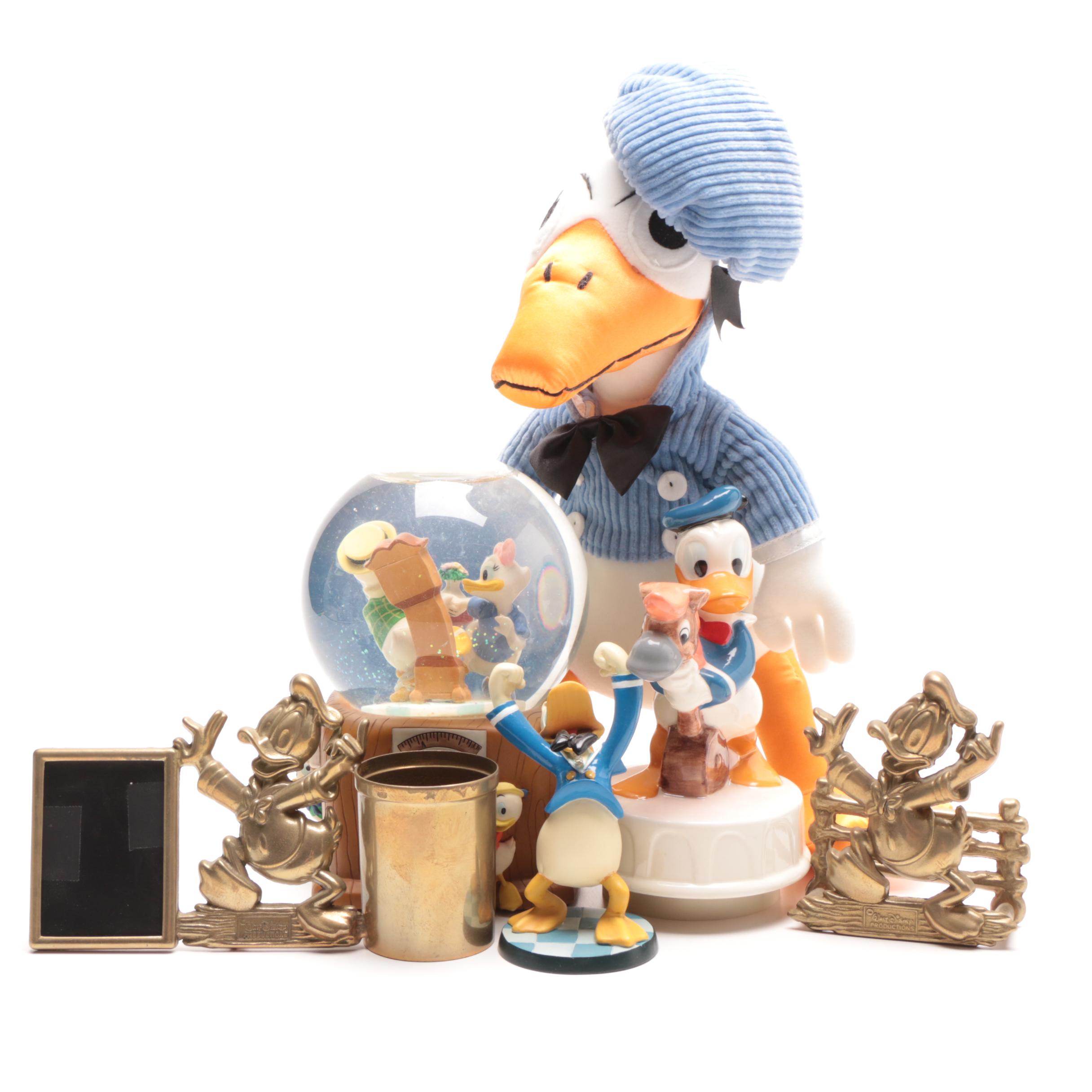 Assorted Donald Duck Figurines and Desk Top Accessories