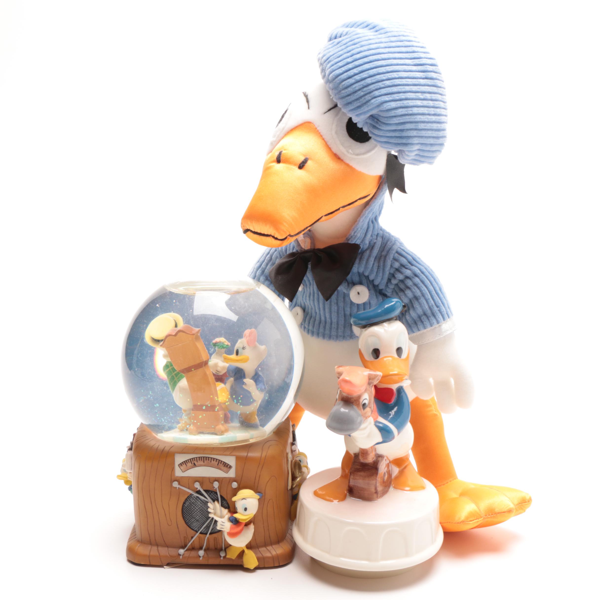 Assorted Donald Duck Figurines and Desk Top Accessories
