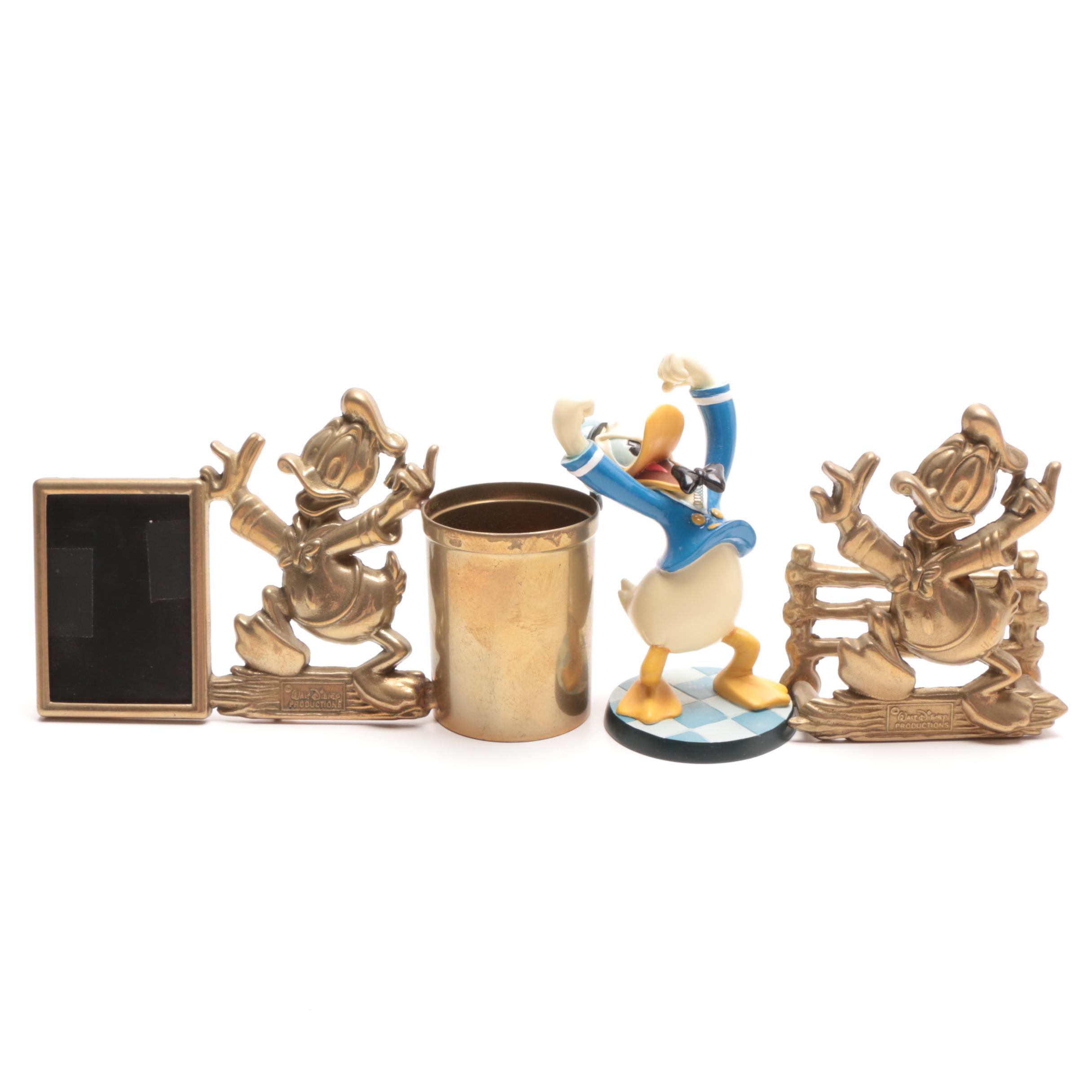Assorted Donald Duck Figurines and Desk Top Accessories