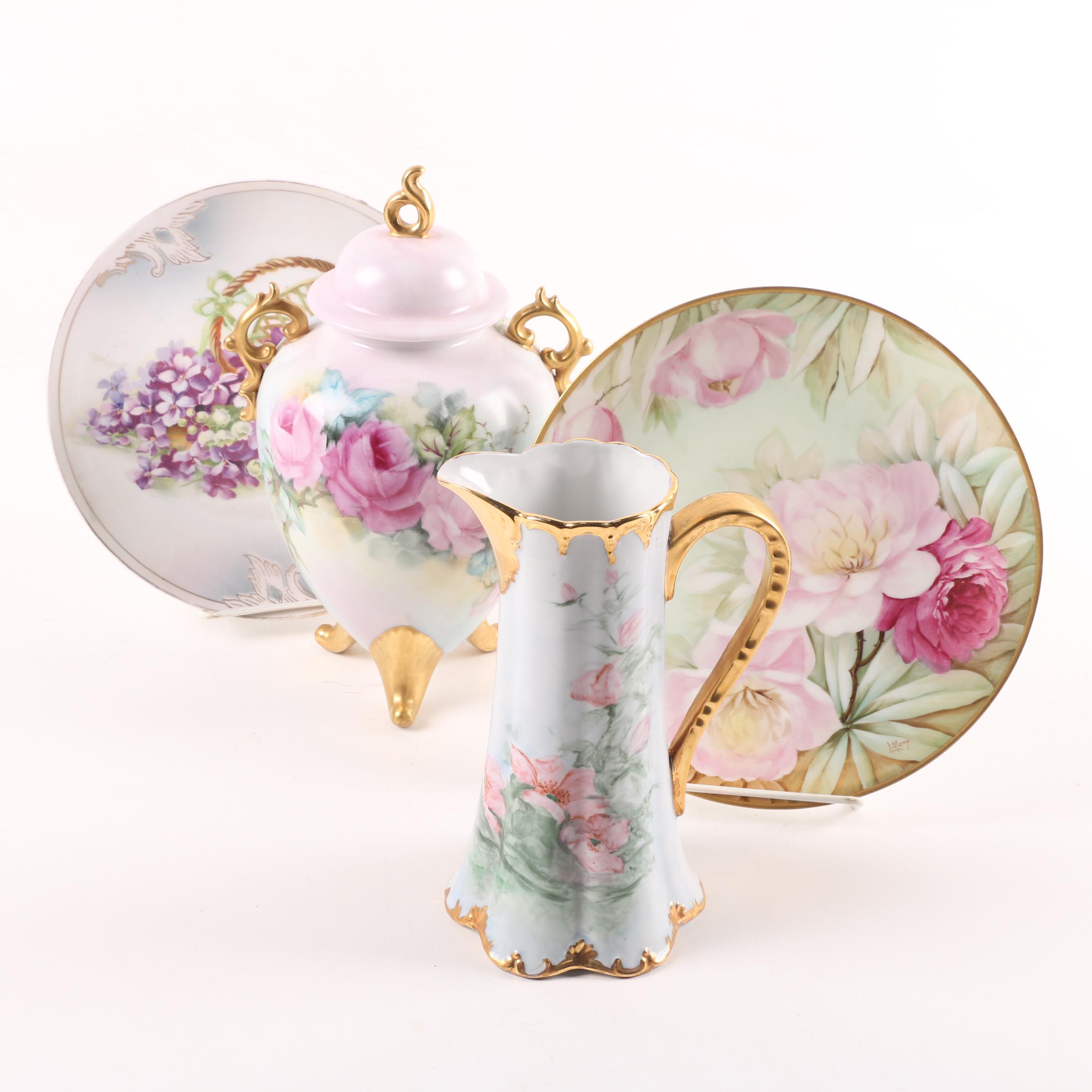 Floral Themed Porcelain Decorative Plates, Lidded Urn, and Coffee Pot