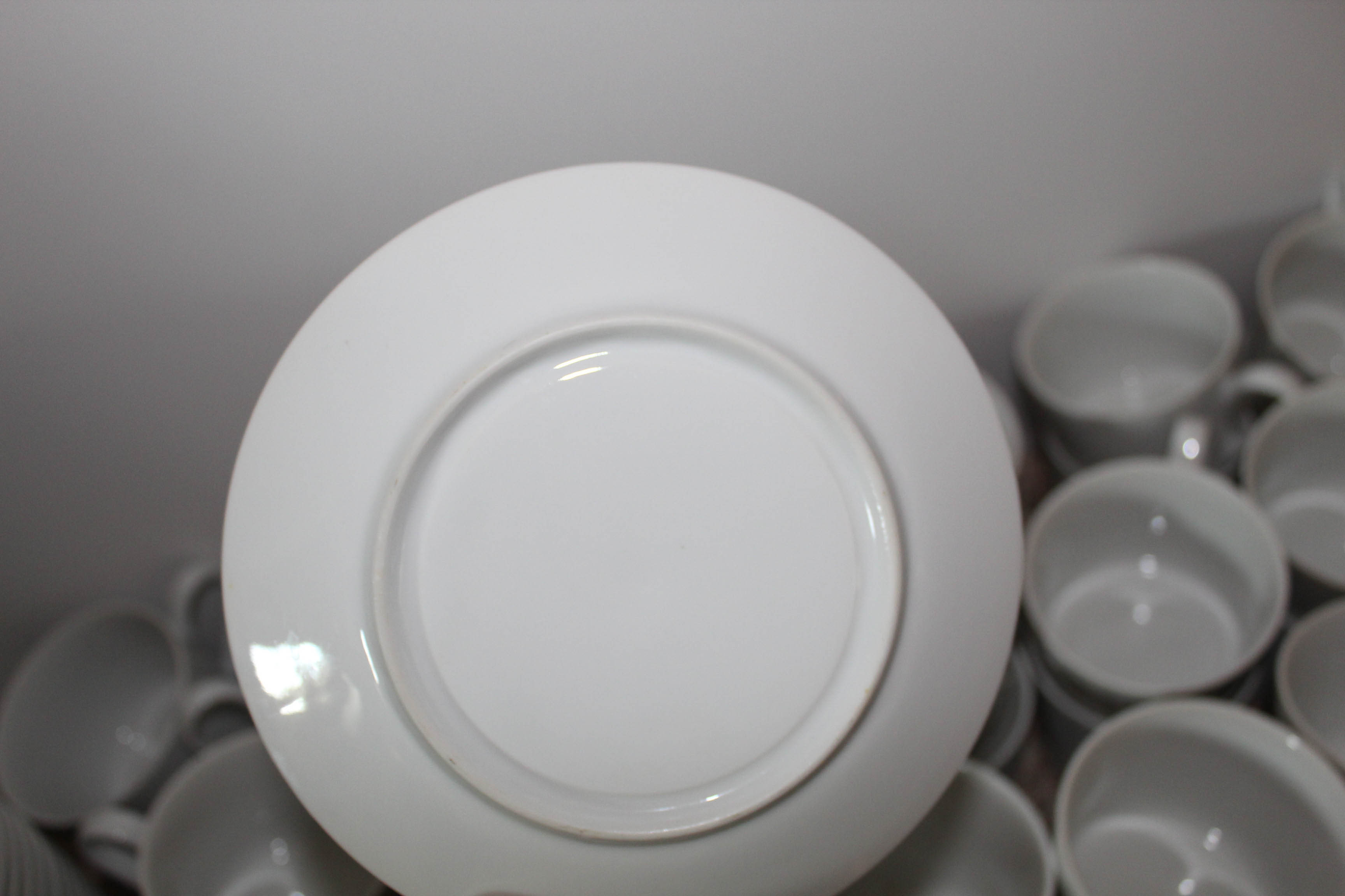 White Porcelain Coffee Mugs, Saucers and Bowls
