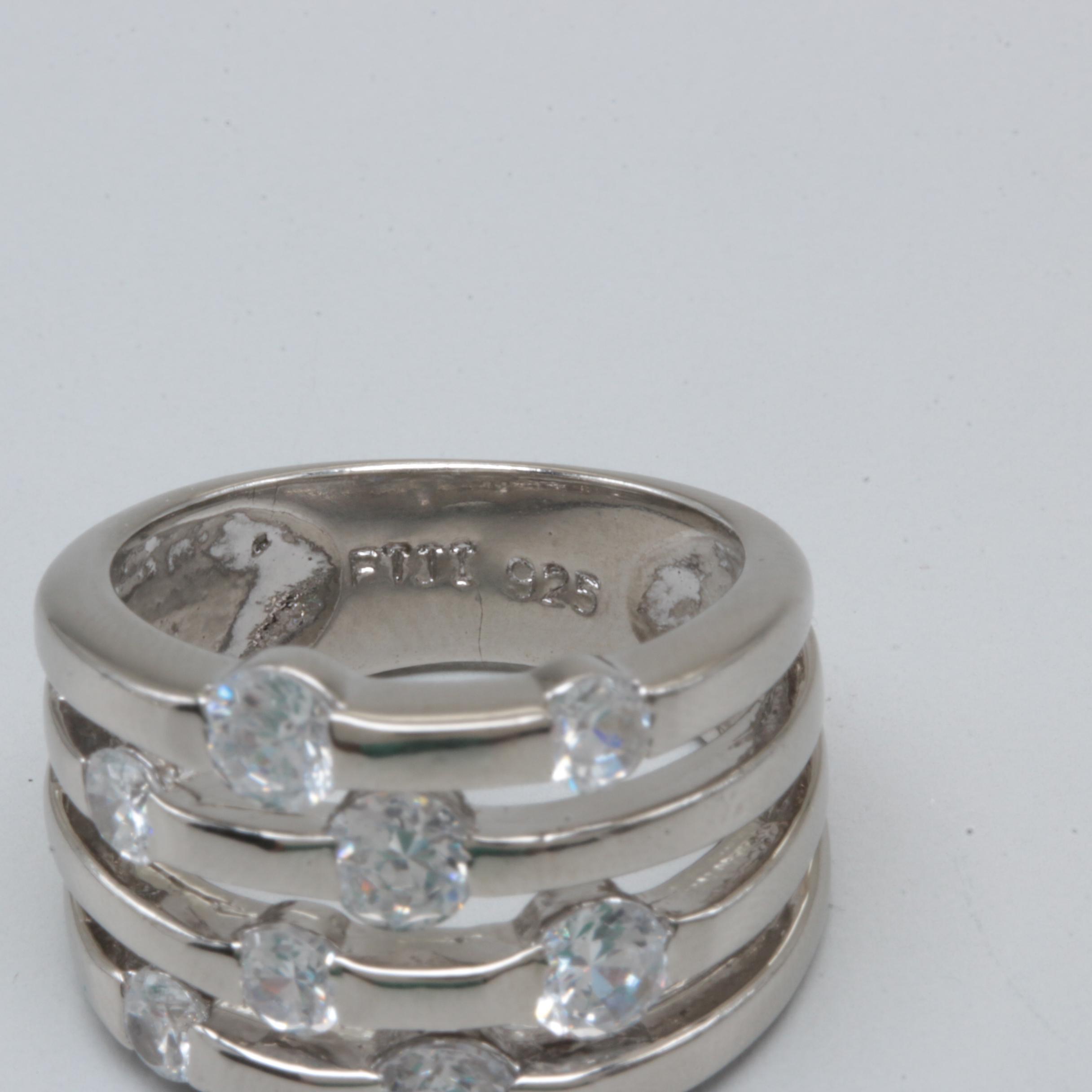 Sterling Silver Rings Including Garnet, Citrine, and Blue Topaz