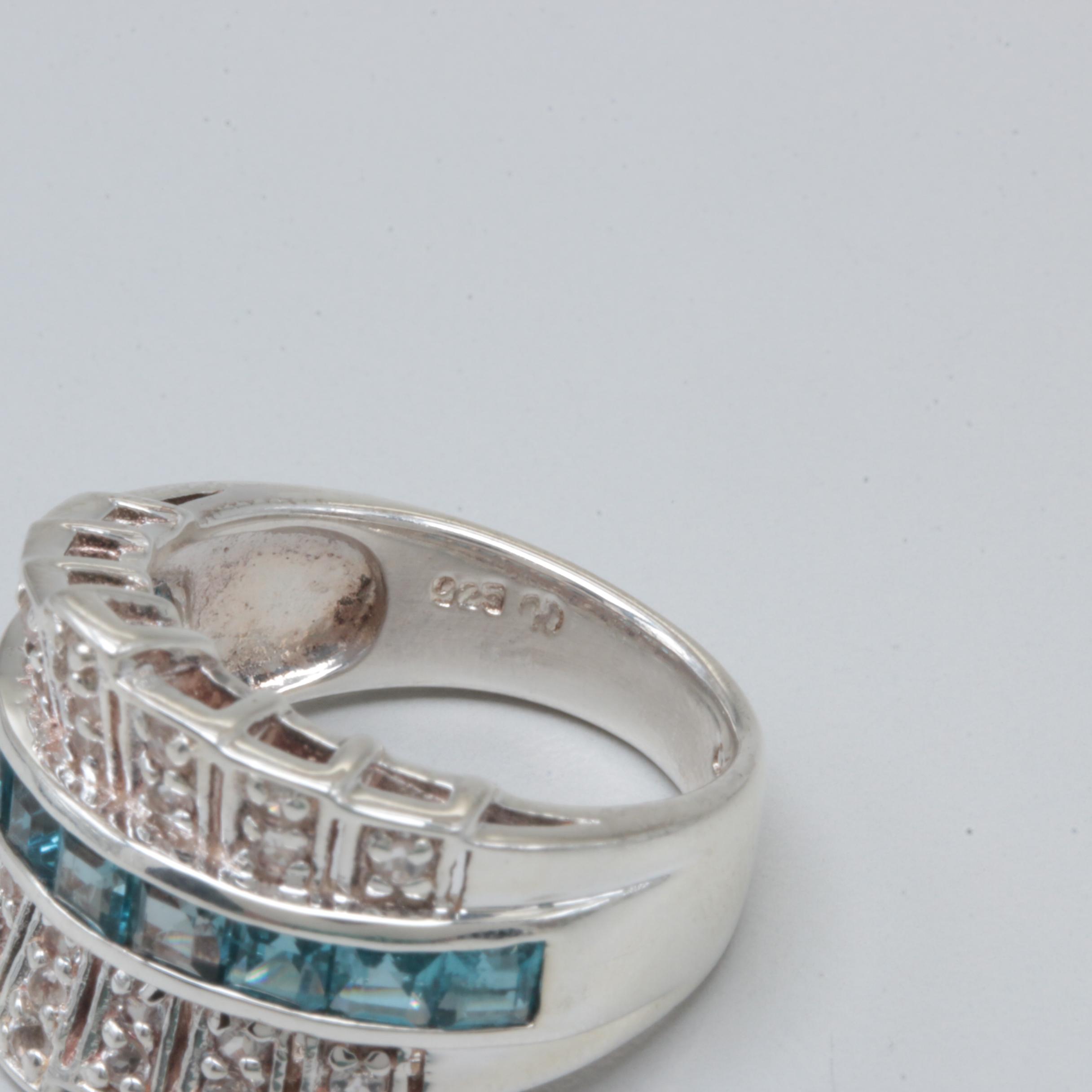 Sterling Silver Rings Including Garnet, Citrine, and Blue Topaz