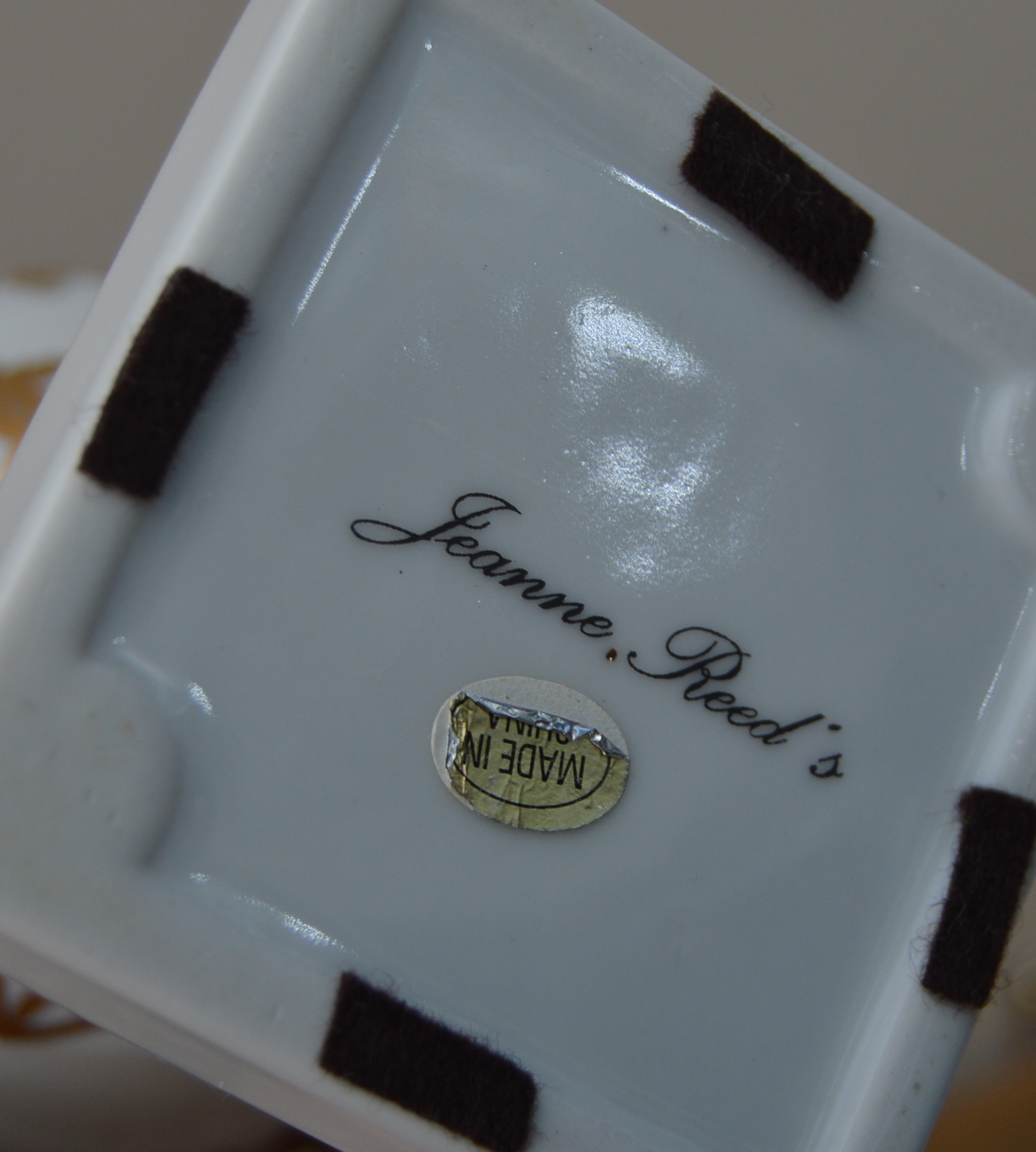 Jean Reed's Porcelain Urns with Black and Gold Neoclassical Corbels