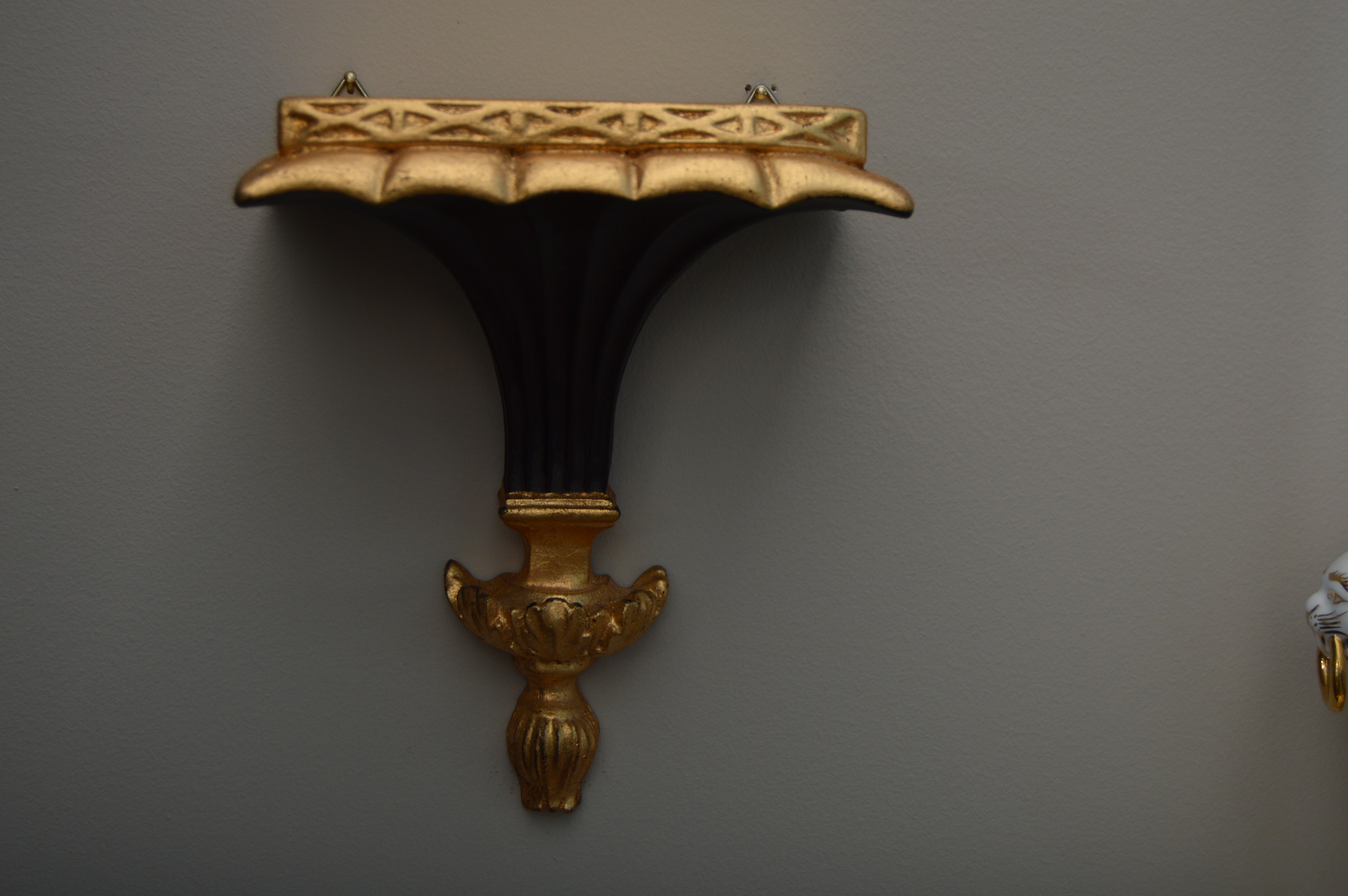 Jean Reed's Porcelain Urns with Black and Gold Neoclassical Corbels