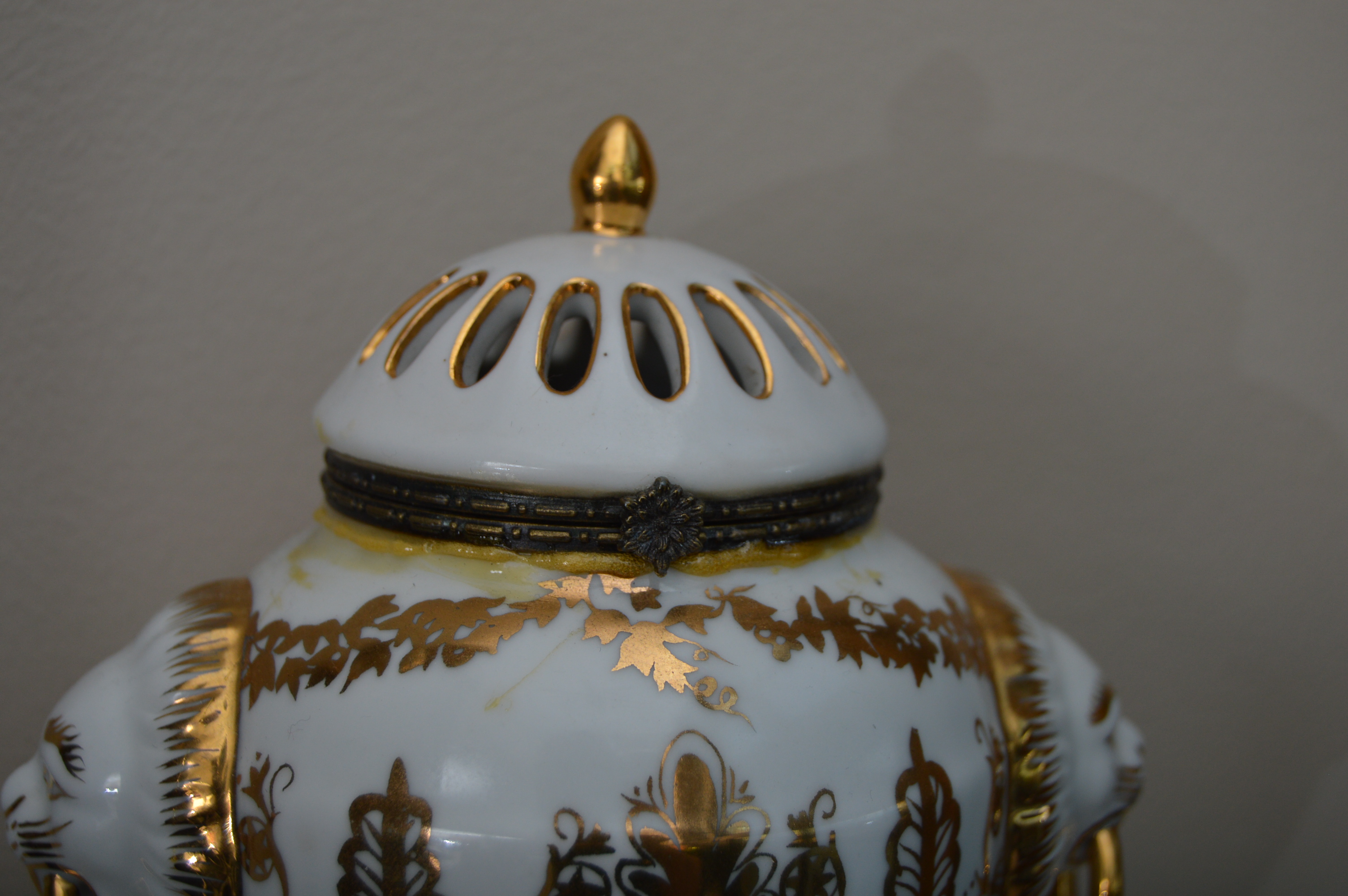 Jean Reed's Porcelain Urns with Black and Gold Neoclassical Corbels