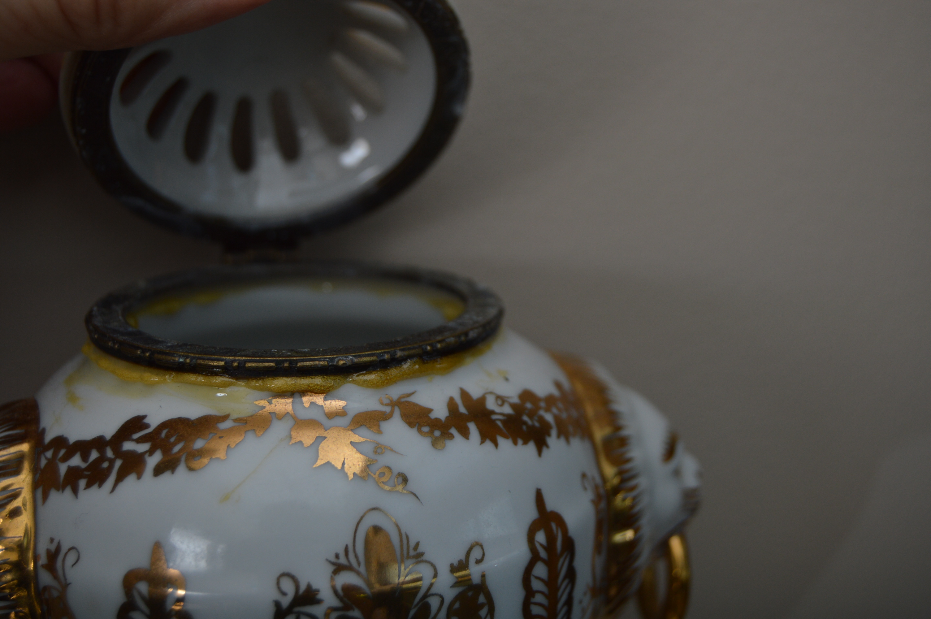 Jean Reed's Porcelain Urns with Black and Gold Neoclassical Corbels