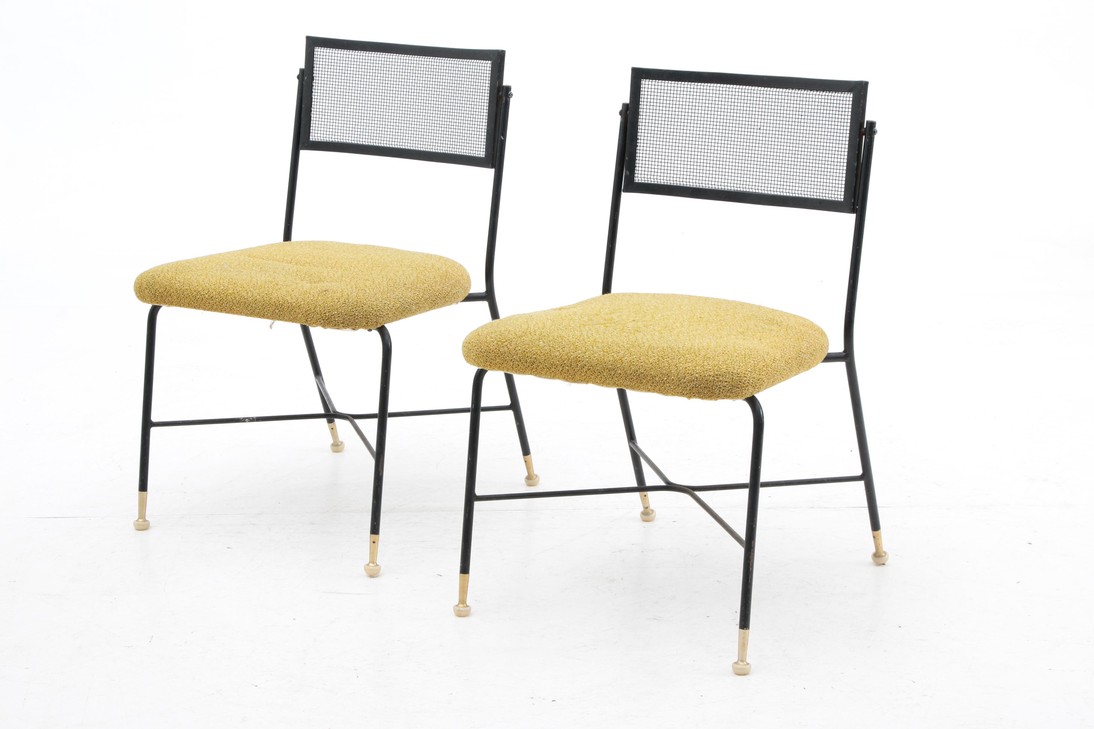 Four Upholstered Wrought Iron Chairs