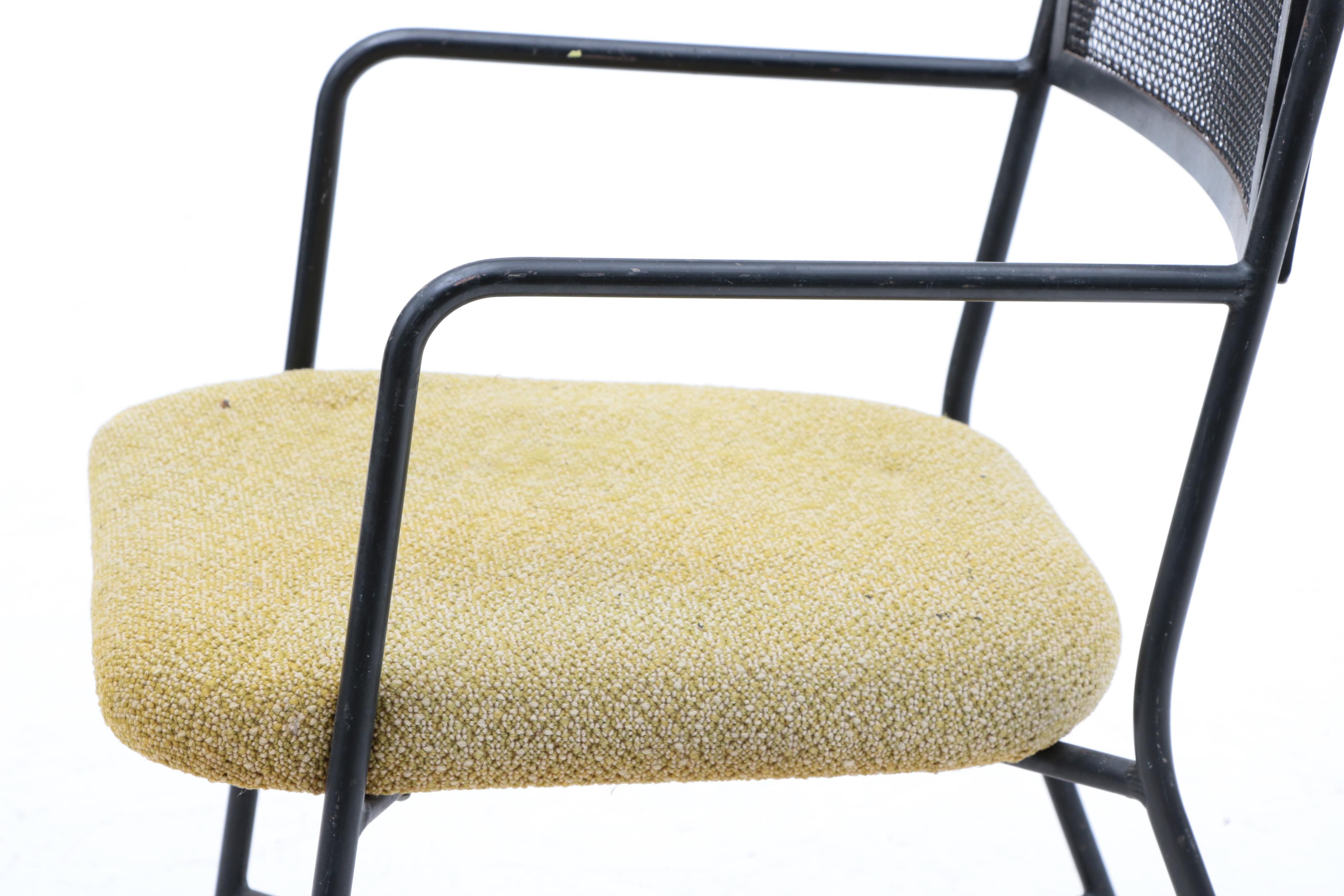 Four Upholstered Wrought Iron Chairs