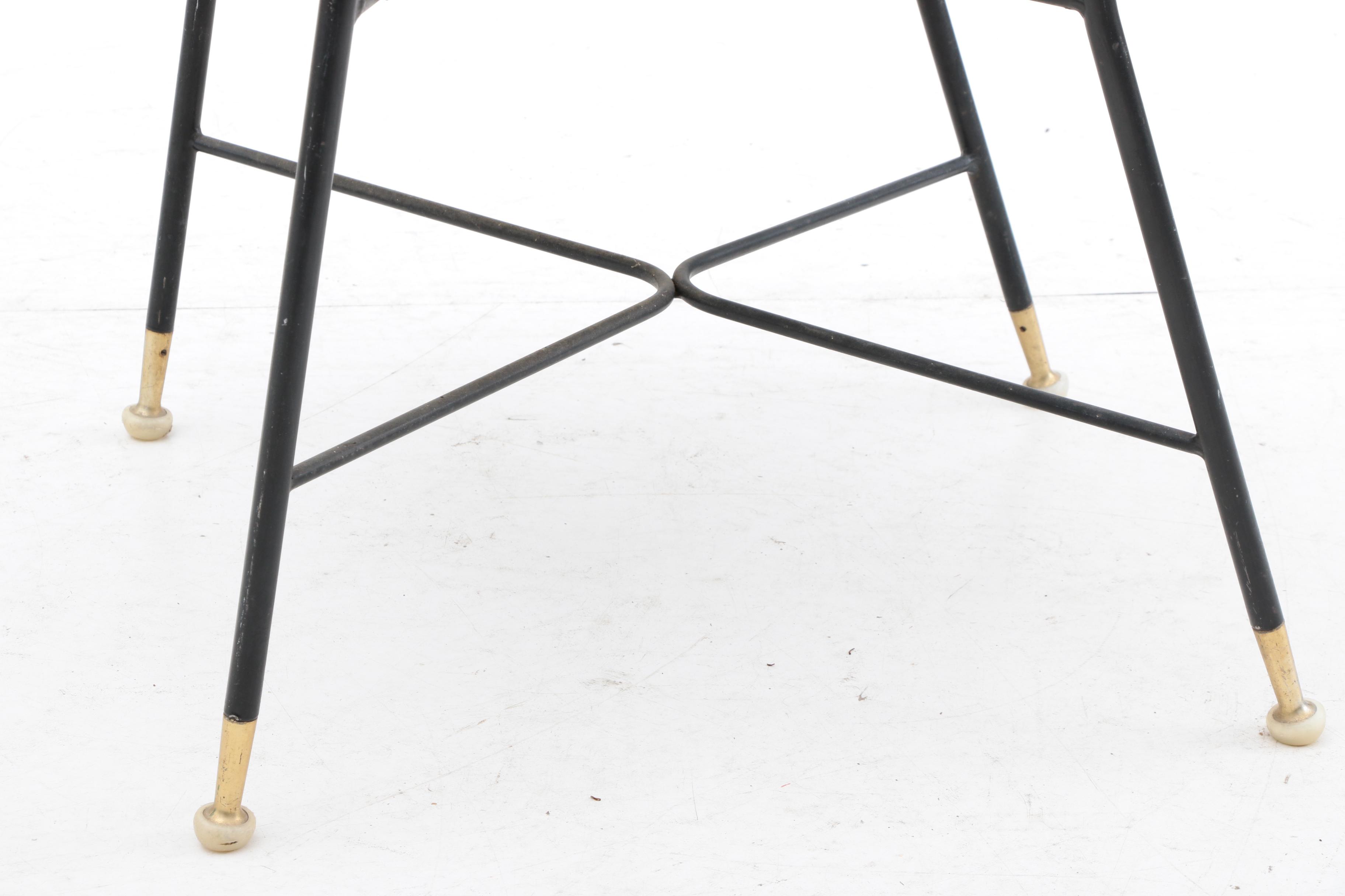 Four Upholstered Wrought Iron Chairs