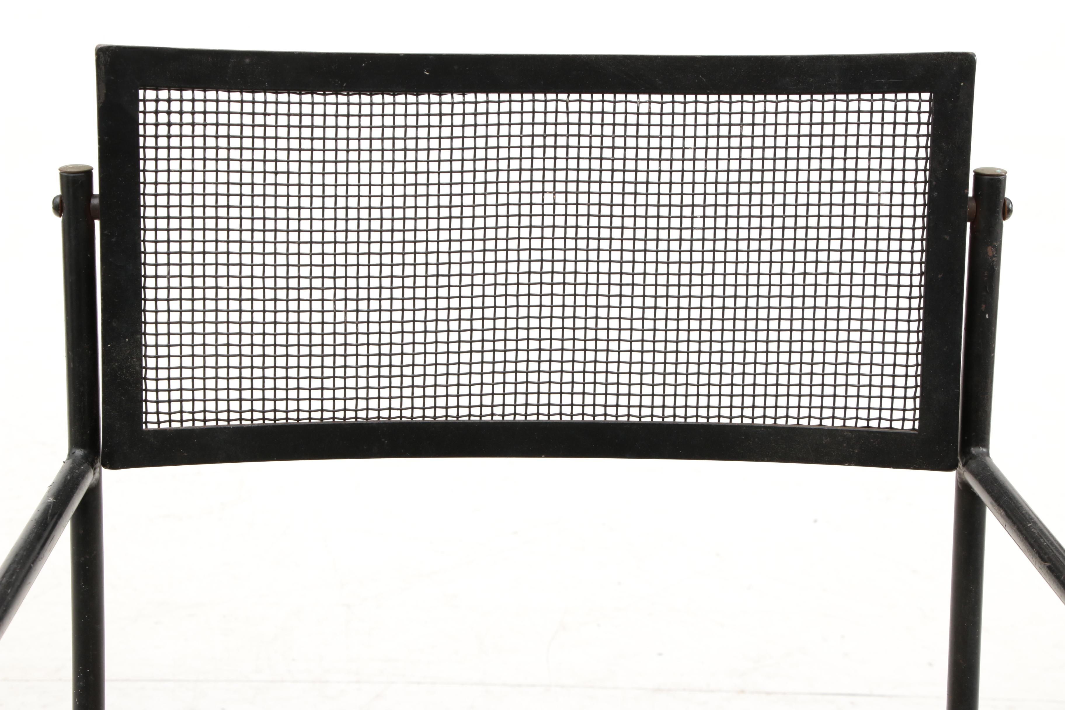 Four Upholstered Wrought Iron Chairs